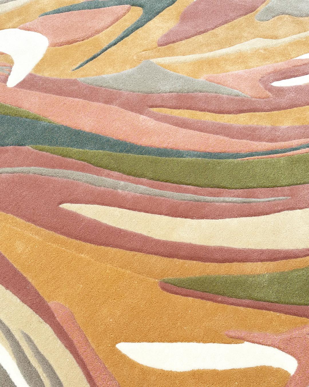 A rug that's all the flair and none of the fuss. Presenting 'Magic Spell' — a bewitching fusion of pastel pizzazz and swirly whirly.