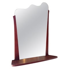 Miroir vintage de forme irrégulière avec étagère