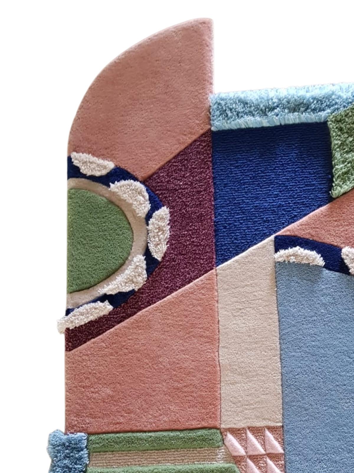 Hey Archie rug is made with a combination of pink blush, blue, green a touch of maroon 

Original Designed by RAG Home Jakarta
Hand-tufted Carpet with mixed Carving Embossed Methods and Colours. 
It can be customised in size. Made by order. Produced