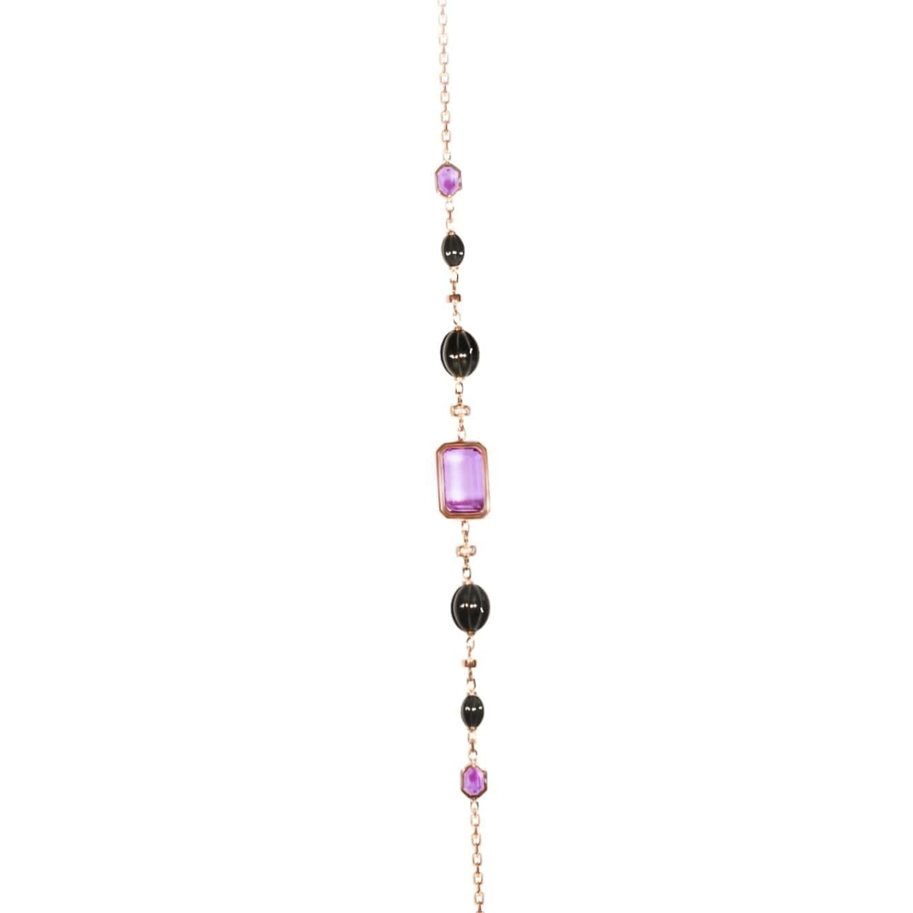 AMETHYST Black Jade Diamonds Pink in 18 Carat Rose Gold Long Necklace 120 cm (47.2 inches). HAND CARVED STONES made from a specific unique designed. HANDCRAFTED IN FRANCE.
The Designer, Bénédicte, decided to Produce all her Creations in her country