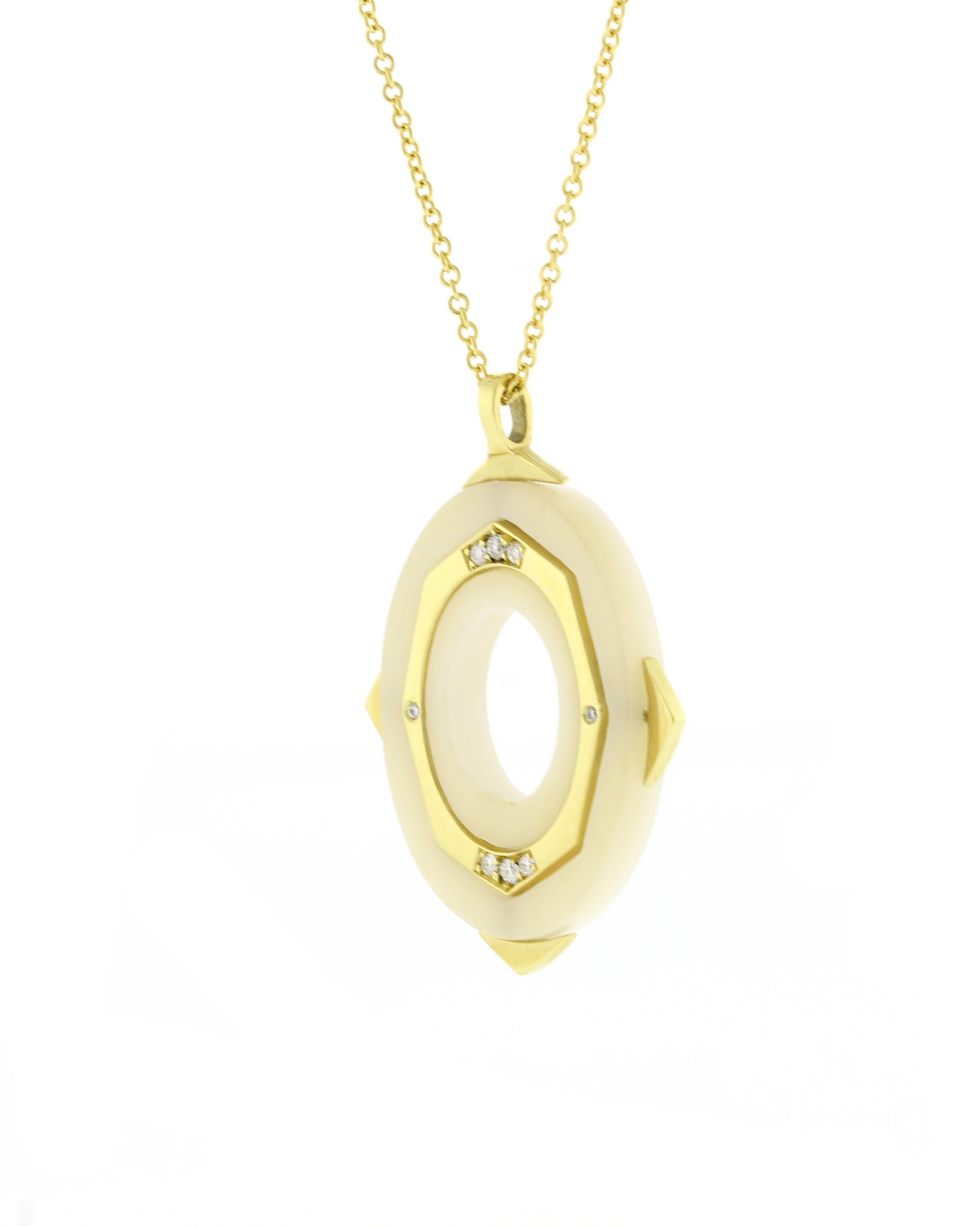 From Irthly by David Alvarado,  a Taqua Nut Palm Ivory Affinity Diamond  Pendant.  Palm Ivory is carved from the Taqua nut also know as vegetable ivory.  A sustainable nut that resembles animal Ivory that can be sustainably grown and harvested
♦