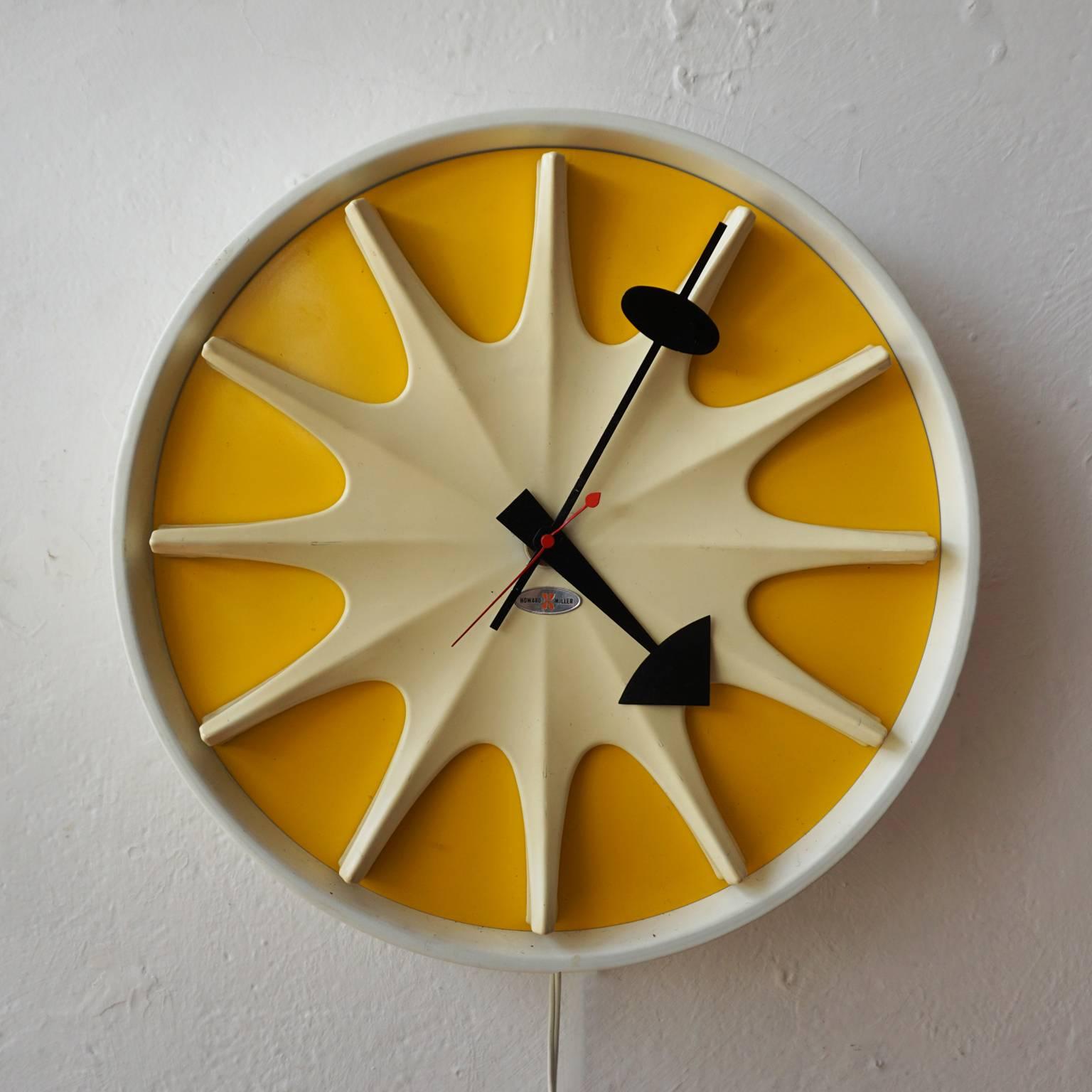 Irving Harper for George Nelson associates wall clock, model #2271-B. Produced by Howard Miller in 1959. Quiet plug in model, with second hand. All original.