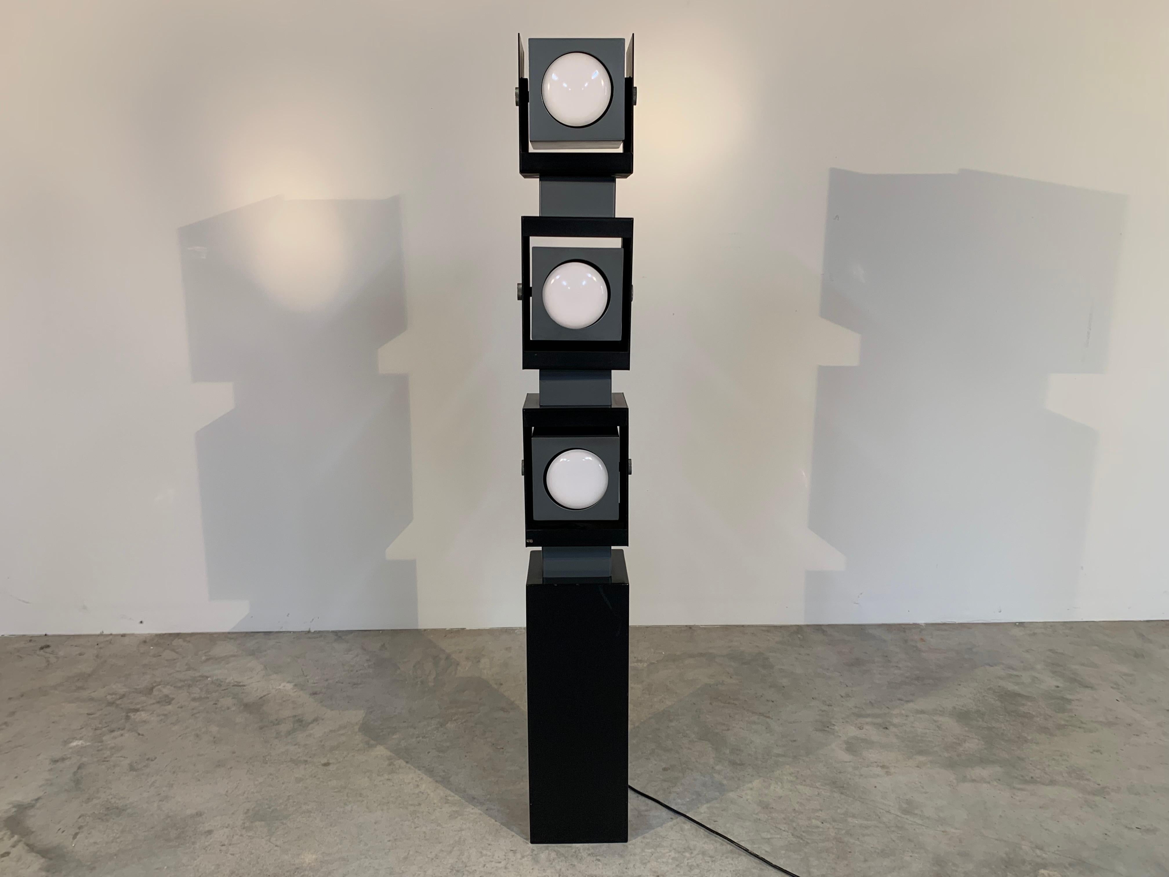 Irving Richard’s for Arteluce-Raynor fully adjustable floor lamp having 3 independent lights that can be directed up, down and 360 degrees. Each has its own on/off switch at the back. Powder coated steel and chrome. 
 Very attractive and versatile