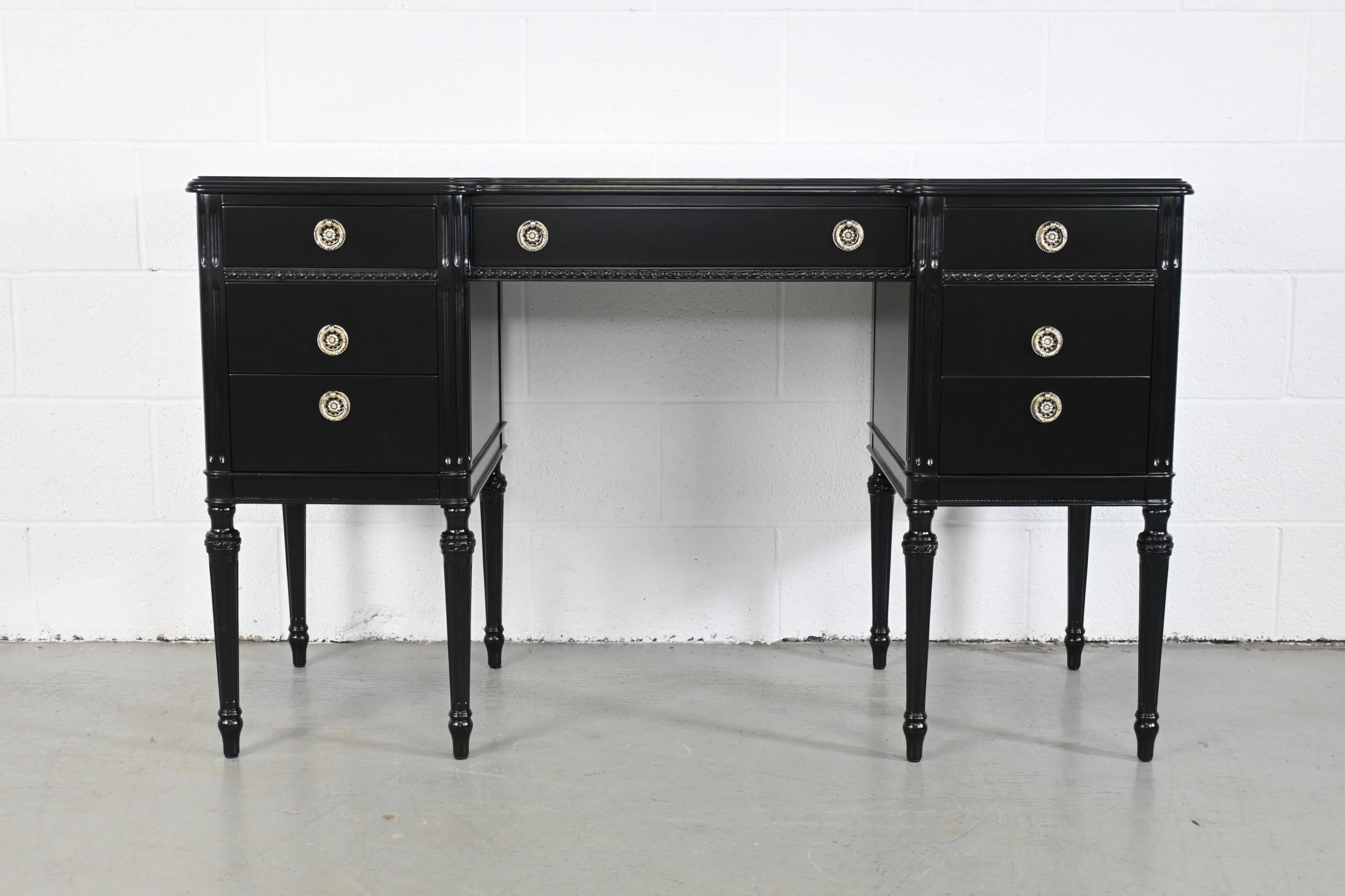 Robert W. Irwin Louis XVI Style Black Lacquered Seven Drawer Desk

Robert W. Irwin Furniture Co., USA, 1940s

50 Wide x 17.75 Deep x 30.25

Louis XVI Style black lacquered desk with seven drawers and brass pulls.

Professionally refinished.
