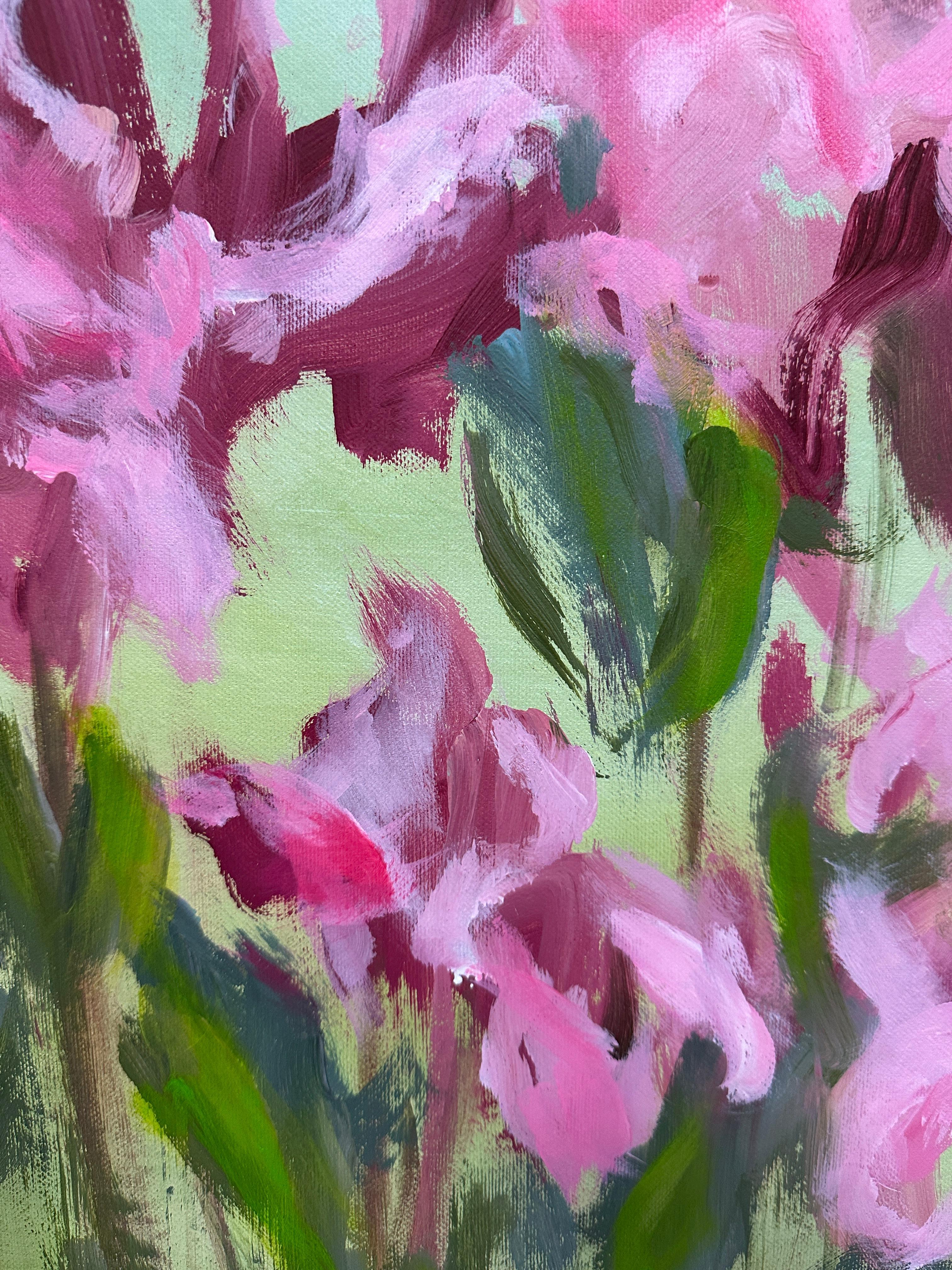 Cette peinture présente des fleurs abstraites dans des tons roses doux qui contrastent délicatement avec un fond vert vibrant, créant un sentiment d'harmonie et d'éveil de la nature. La palette chaude et les coups de pinceau fluides rendent cette