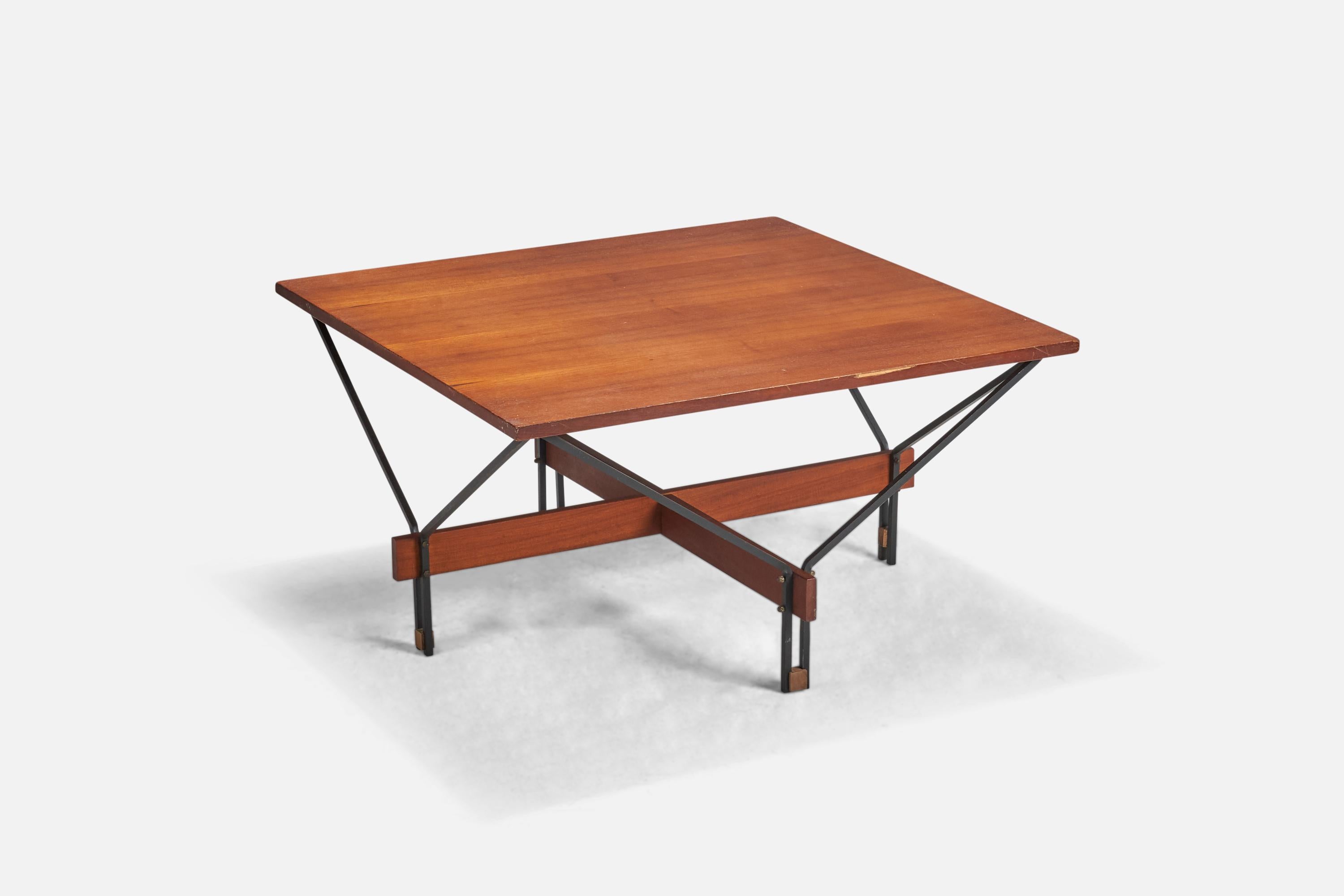 A walnut and lacquered metal coffee table designed and produced by ISA Bergamo, Italy, 1950s.