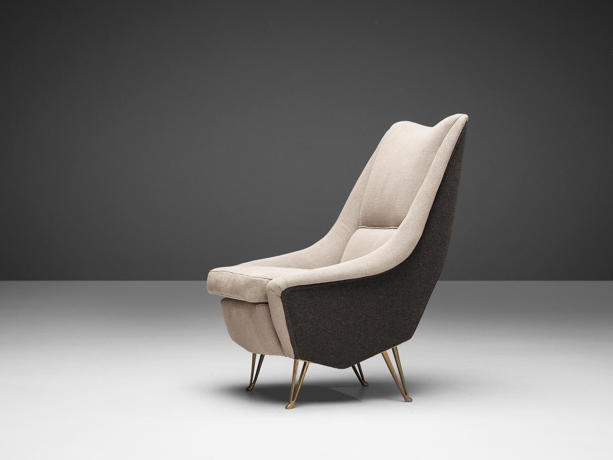 Lounge chair for ISA Bergamo, brass, fabric, Italian, 1960s

Graceful Italian lounge chair with highback. This lounge chair is beautiful to look at due to its interesting chair. This gorgeous shape is highlighted by the bicolor upholstery. The