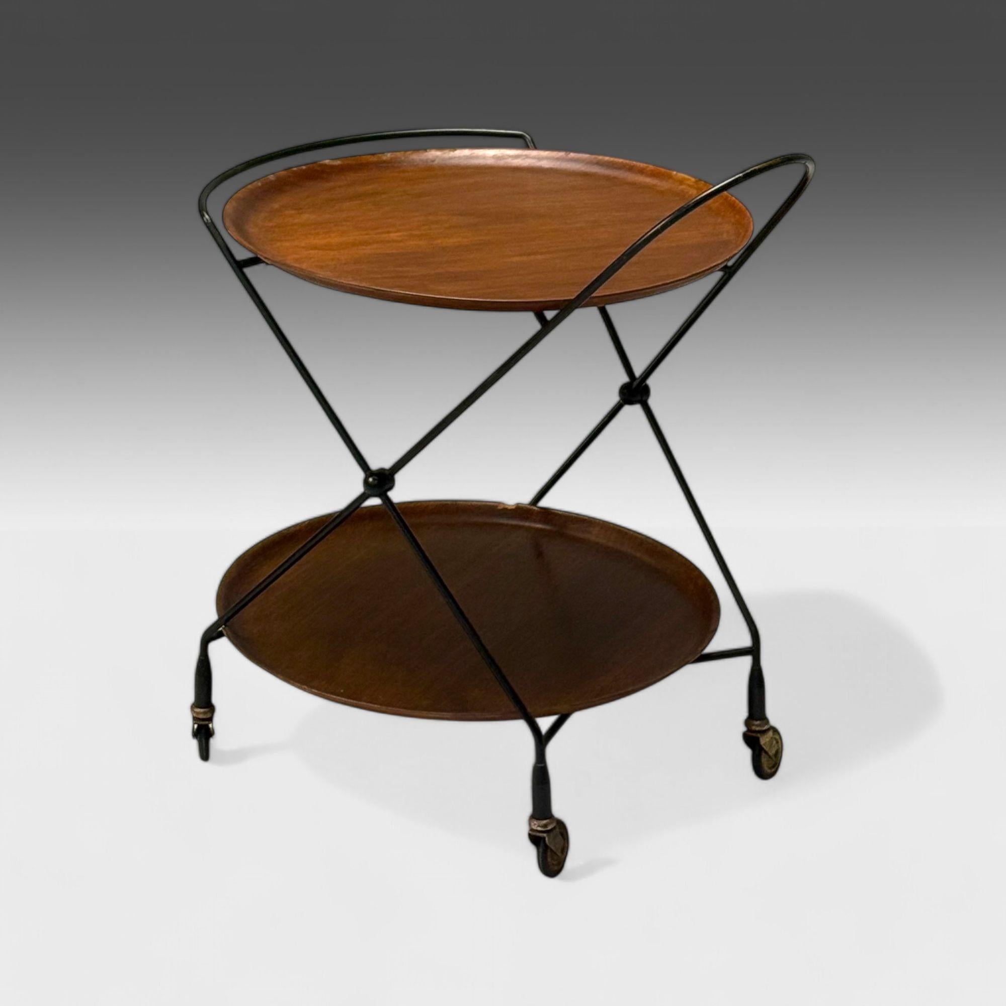 ISA Bergamo, Italian Mid-Century Modern, Small Collapsible Bar Cart or Trolley, Teak, Metal, 1950s

Small trolley on wheels designed and produced by ISA Bergamo in Ponte San Pietro, Italy c. 1950s. This example features two teak platforms supported