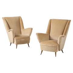 Gio Ponti pour ISA Bergamo Paire de chaises longues à dossier en forme d
aile, vers 1950