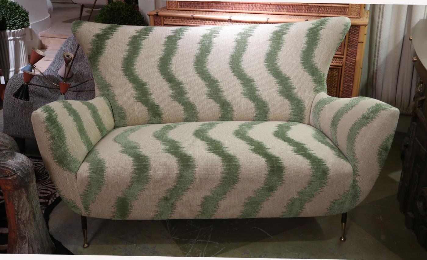 ISA Bergamo, iron, brass legs, green velvet and linen midcentury Italian sofa, 1950.