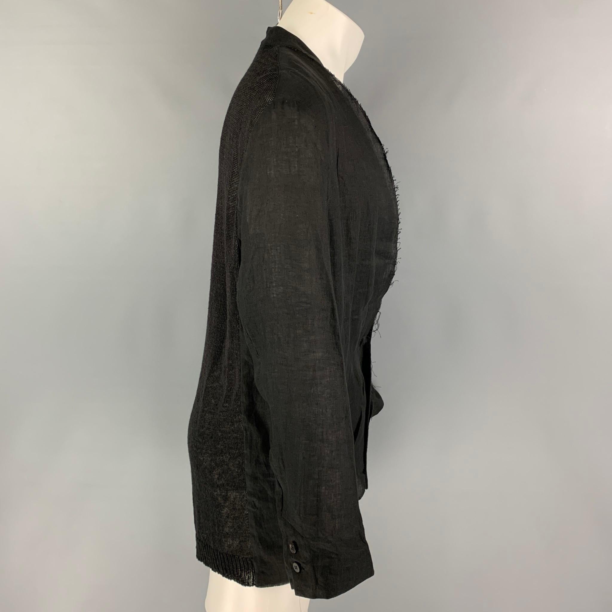 ISABEL BENENATO SS 17 jacket comes in a black mixed fabrics featuring a shawl flap detail, patch pockets, knitted back, and a single button closure. Made in Italy. 

Excellent Pre-Owned Condition.
Marked: 50

Measurements:

Shoulder: 19.5 in.
Chest:
