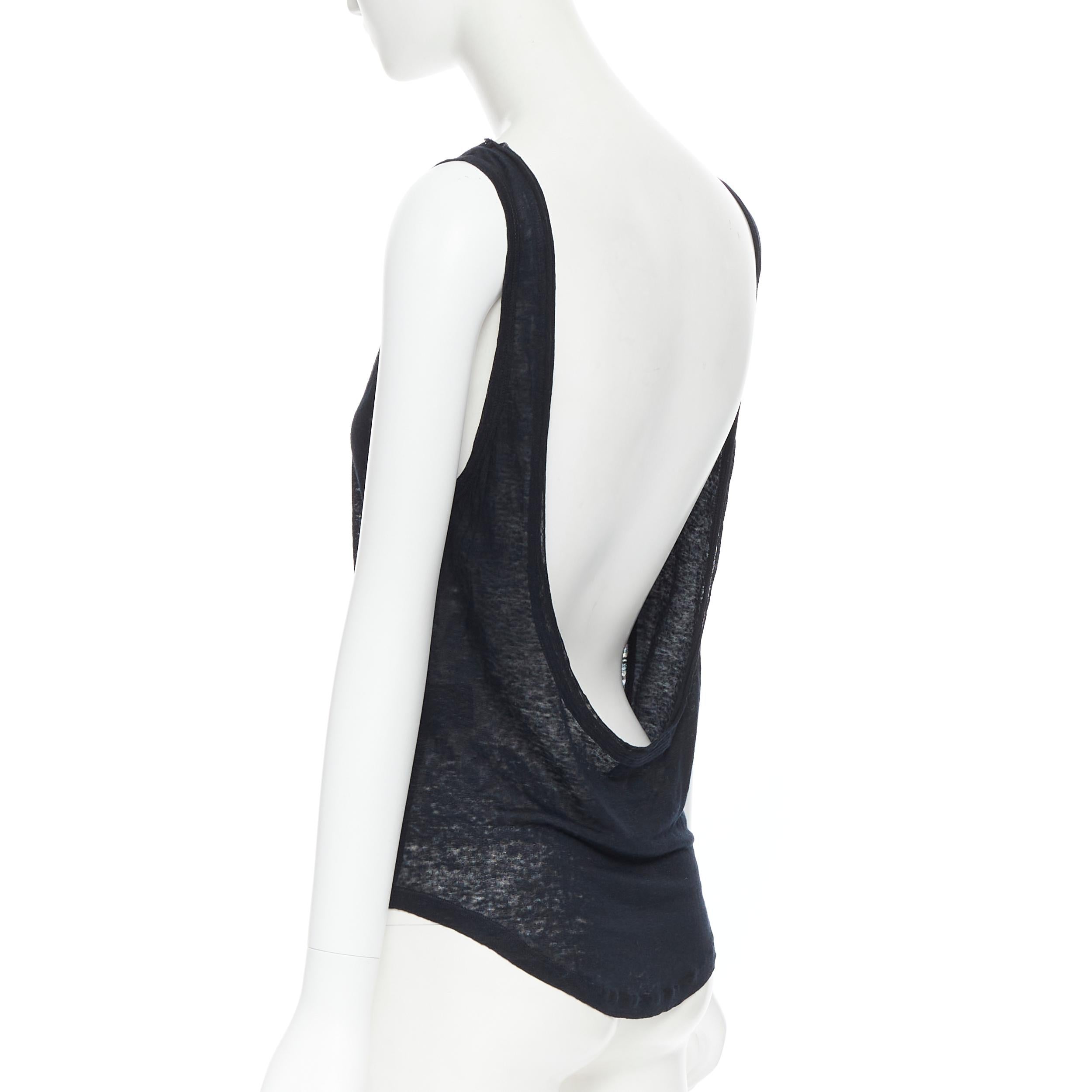 ISABEL MARANT 100% lino nero Canotta nera con scollo aperto e orlo curvo sul retro M 
Riferimento: LNKO/A01735 
Marchio: Isabel Marant 
Designer: Isabel Marant 
Materiale: Lino 
Colore: nero 
Modello: Tinta unita 
Dettaglio extra: Collo rotondo. Si