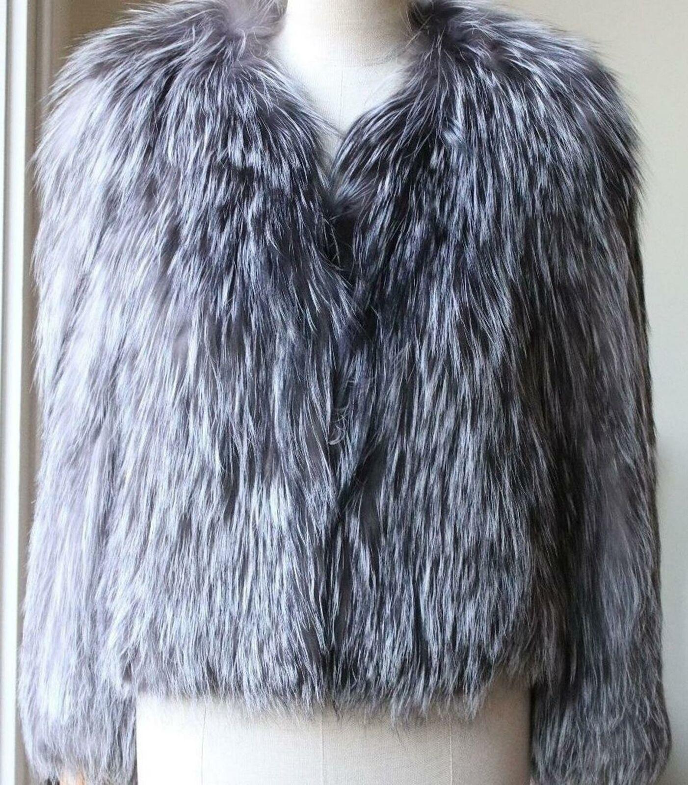 This 'Aileen' jacket by Isabel Marant is crafted from grey fox-fur in a boxy cut is perfect for those wintery months.
Grey fox fur.
Hook fastening at front.
100% Fox; lining: 100% cotton.
Size: FR 38 (UK 10, US 6, IT 42)
Bust measures approx. 36.7