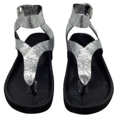 Sandales plates à bride à la cheville Isabel Marant en cuir argenté métallisé