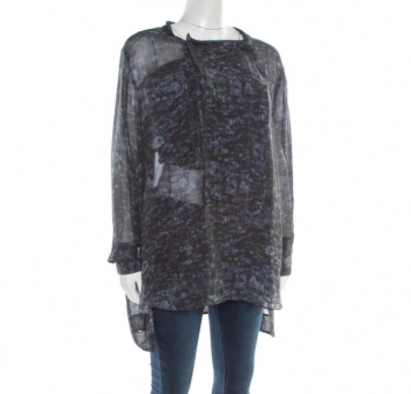 Mit diesem unwiderstehlichen Tunika-Top von Isabel Marant liegen Sie modisch voll im Trend. Das aus Seide geschneiderte Kleid ist eine perfekte Mischung aus Mode und Komfort. Die kräftige schwarze Farbe und der abstrakte Druck machen es noch