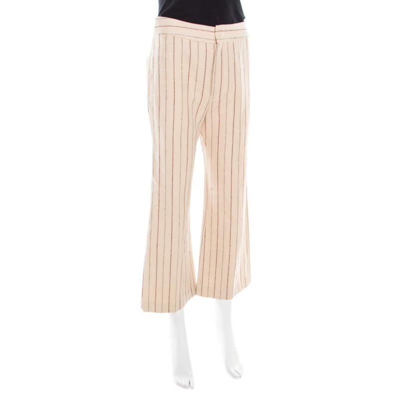 Made from linen and wool, this pair of Isabel Marant pants is designed as flared with stripes all over. The comfortable creation will surely add a stylish touch to your formal fashion.

