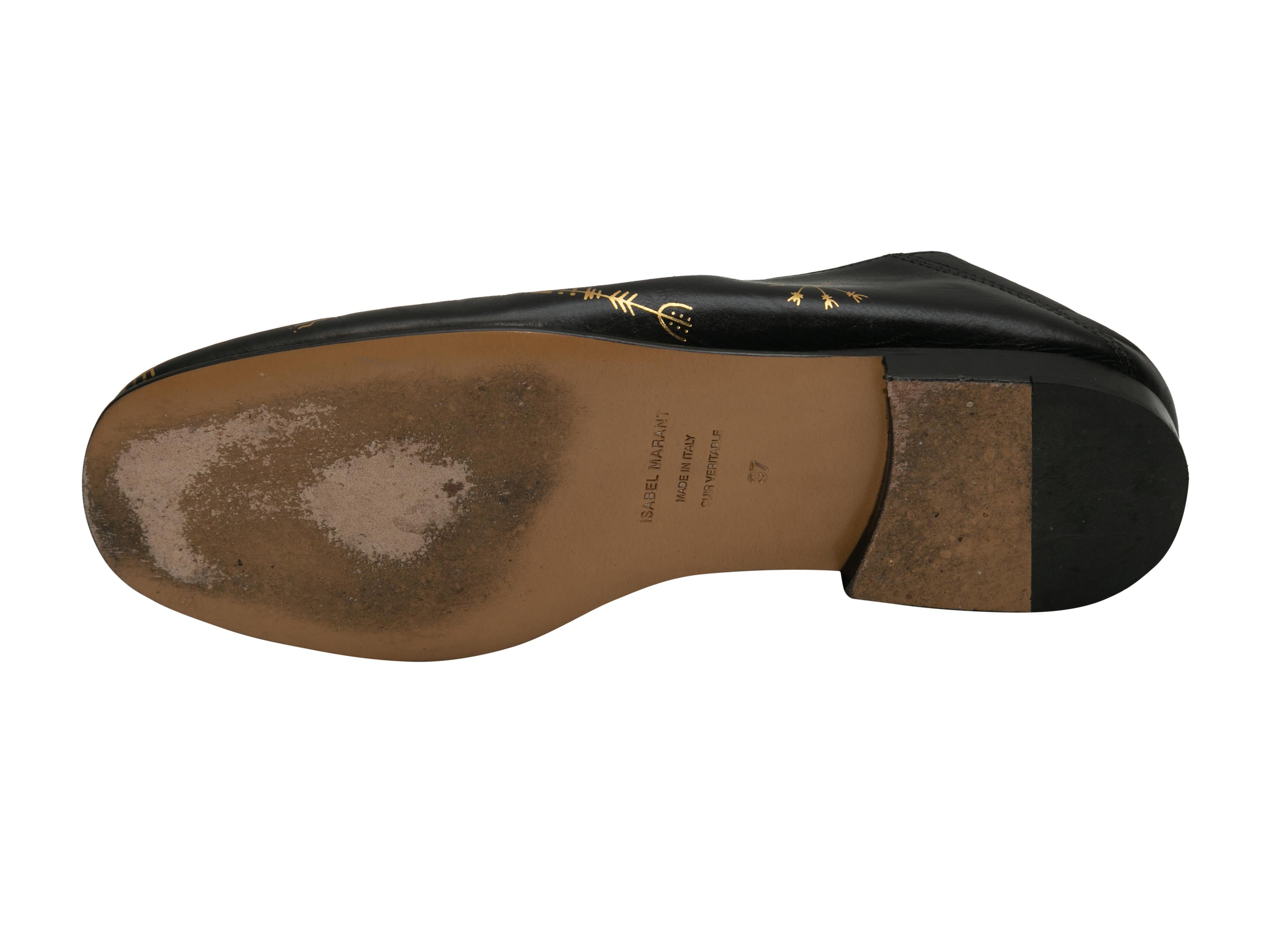 Product details: Black and gold leather 'Half Awake' loafers by Isabel Marant. Stacked heels. 0.5