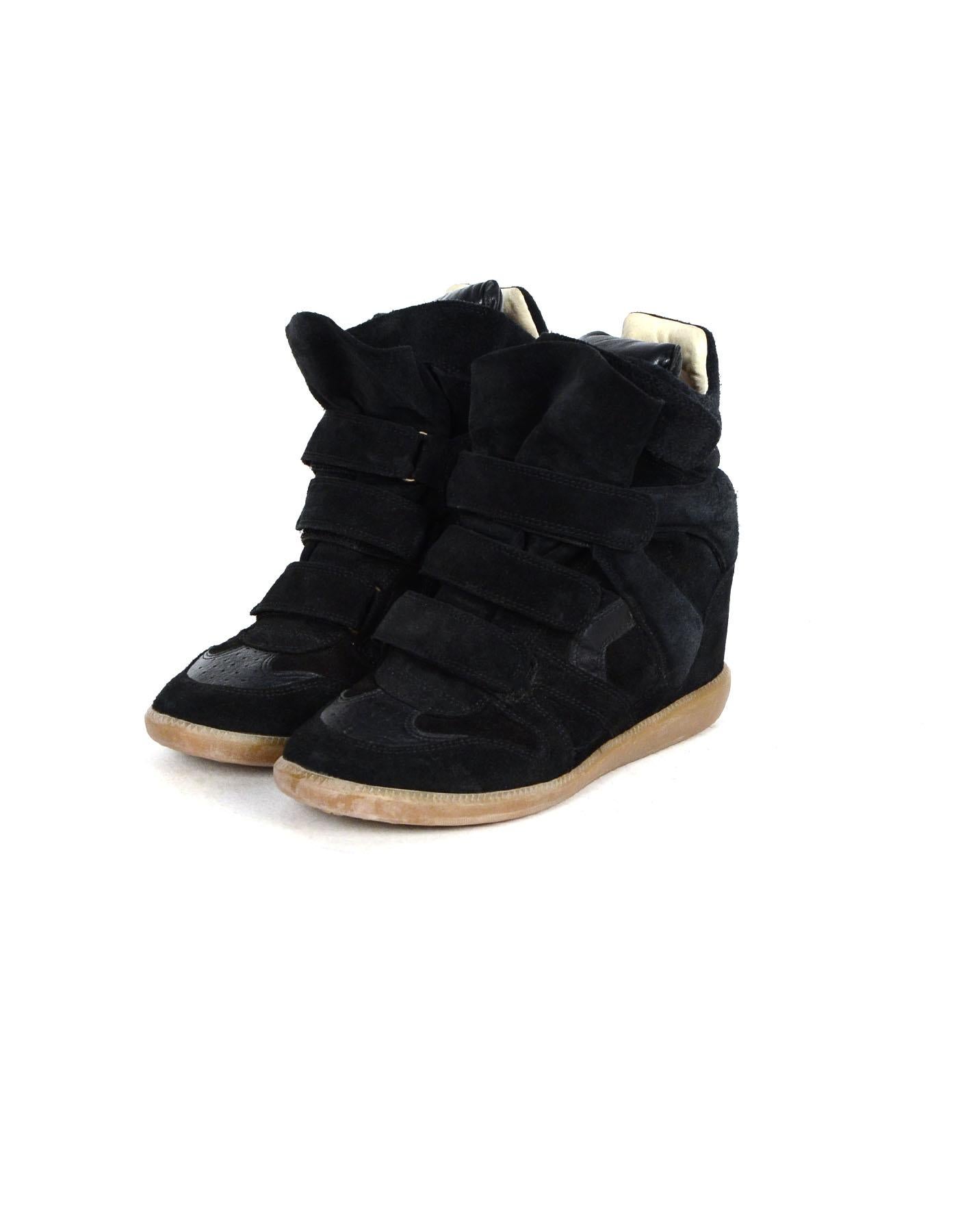 Isabel Marant Black Suede Bekett Wedge Sneakers sz 41

Made In: Portugal
Color: Black with gum rubber sole
Materials: Suede, leather, rubber
Closure/Opening: Velcro
Overall Condition: Excellent pre-owned condition.  Light wear to suede throughout. 