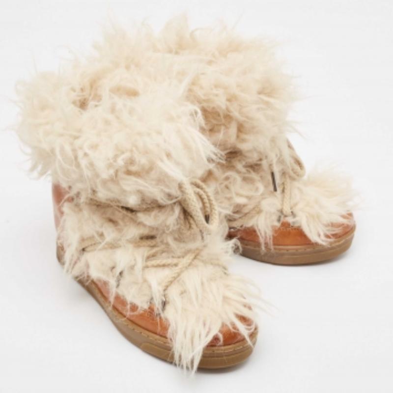 Beige Isabel Marant Bottes en cuir et fourrure marron Taille 37 en vente
