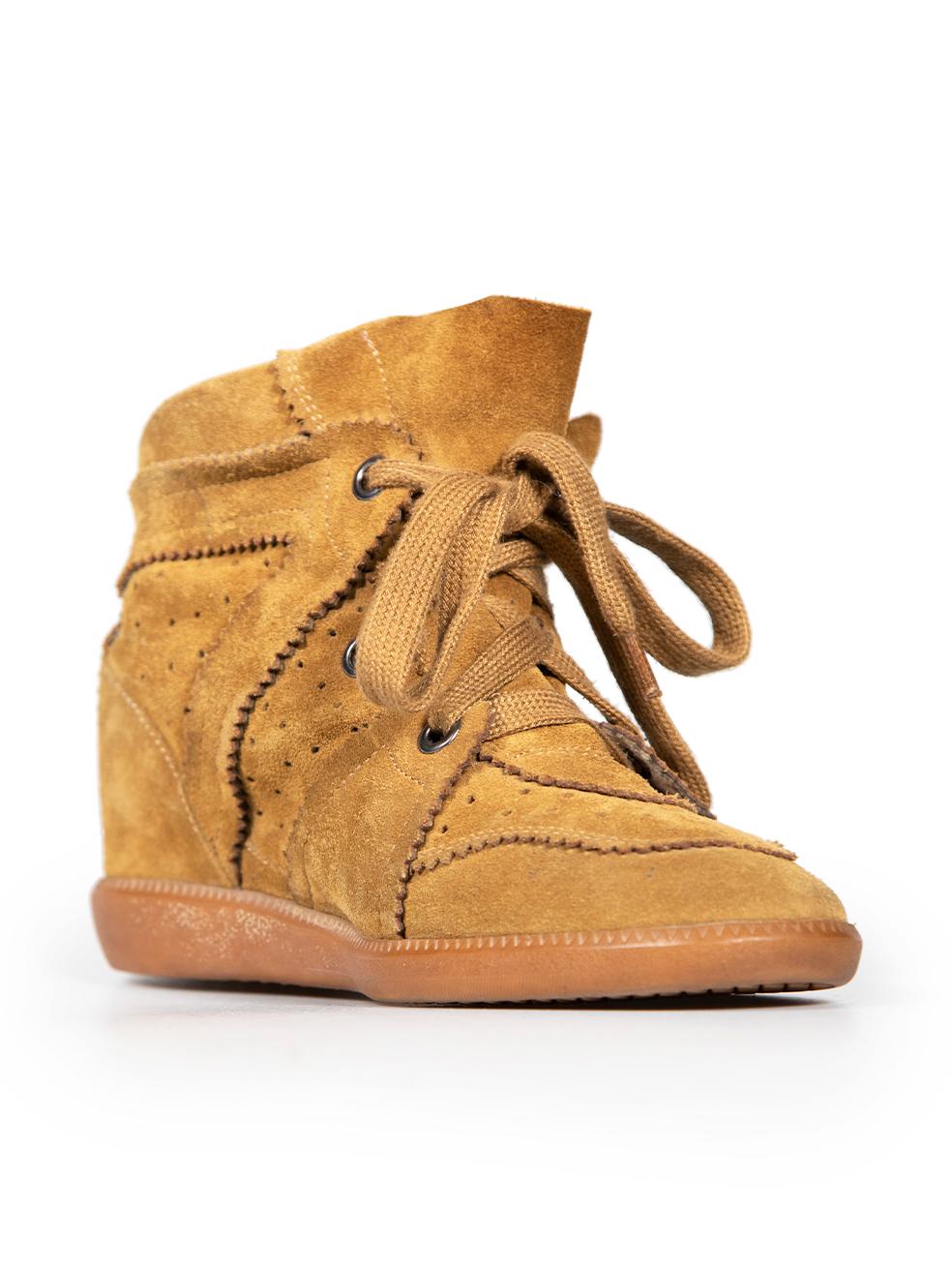 CONDITION is Very good. Minimal wear to shoes is evident. Minimal wear to both shoe outsoles with marks to the rubber on this used Isabel Marant designer resale item.
 
 
 
 Details
 
 
 Brown
 
 Suede
 
 Wedge trainers
 
 Lace up fastening
 
 Round