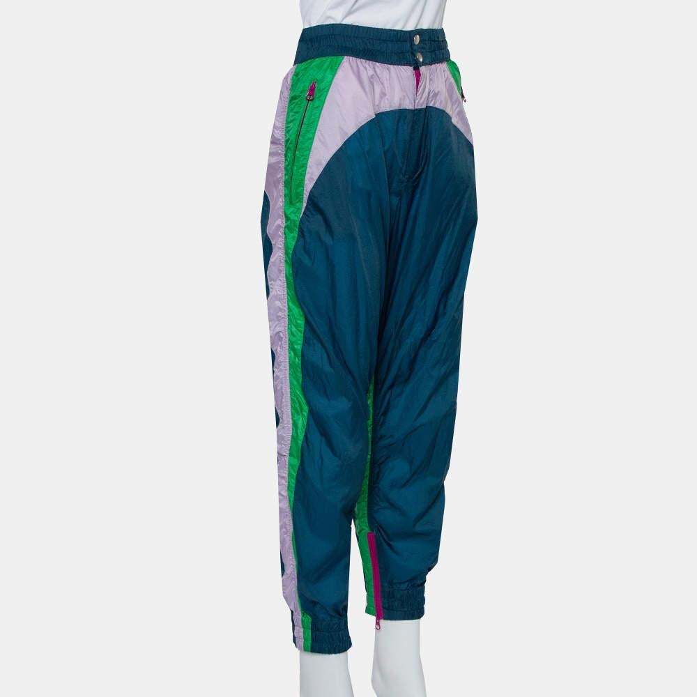 Joggers are also a favored choice for work-from-home or stay-at-home fashion. Get the ultimate comfort you need with this pair of joggers by Isabel Marant. Made from light synthetic fabric, the pair features a color block style, a comfortable