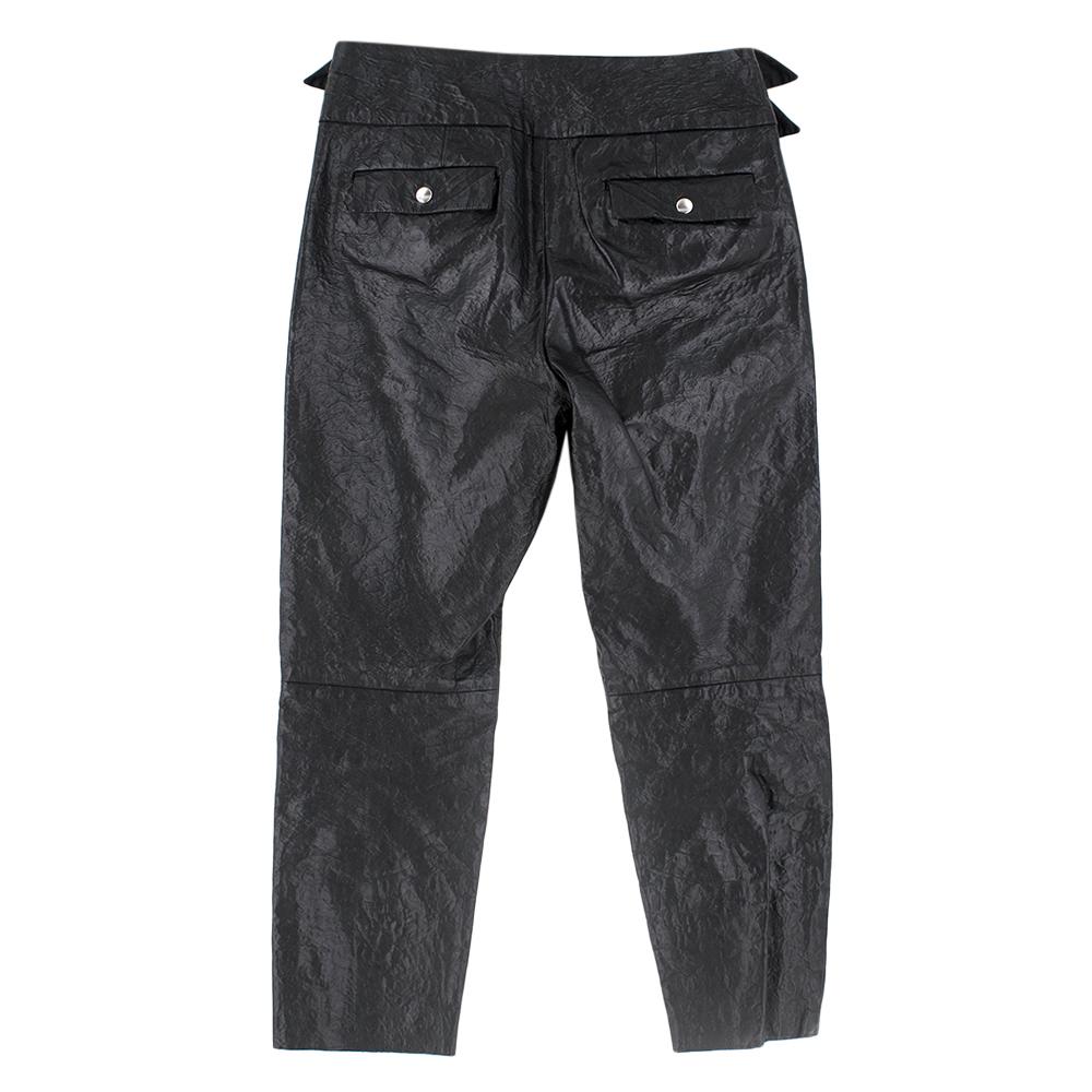 Isabel Marant Cropped Buckle Detail Leather Pants 

- Black leather straight-fit pants 
- Metal hardware on the front 
- Front zip 

Please note, these items are pre-owned and may show signs of being stored even when unworn and unused. This is
