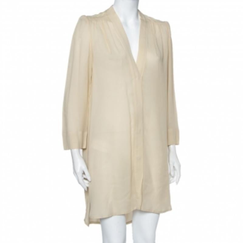 A casual, stylish shift dress from Isabel Marant that you can pair with both heels and flats. It is made from a cotton blend and features long sleeves, button closure, and a V neckline.