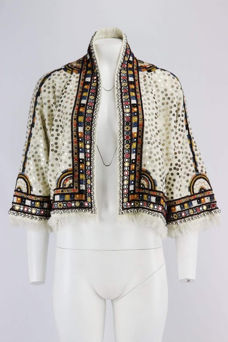 Isabel Marant embellished canvas jacket. Cream. Long sleeve, v-neck. Slips on. 100% Wool; lining: 100% silk; lining2: 100% cotton; embroidery: 100% cotton. Size: FR 40 (UK 12, US 8, IT 44). Shoulder to shoulder: 18 in. Bust: 52 in. Waist: 47 in.