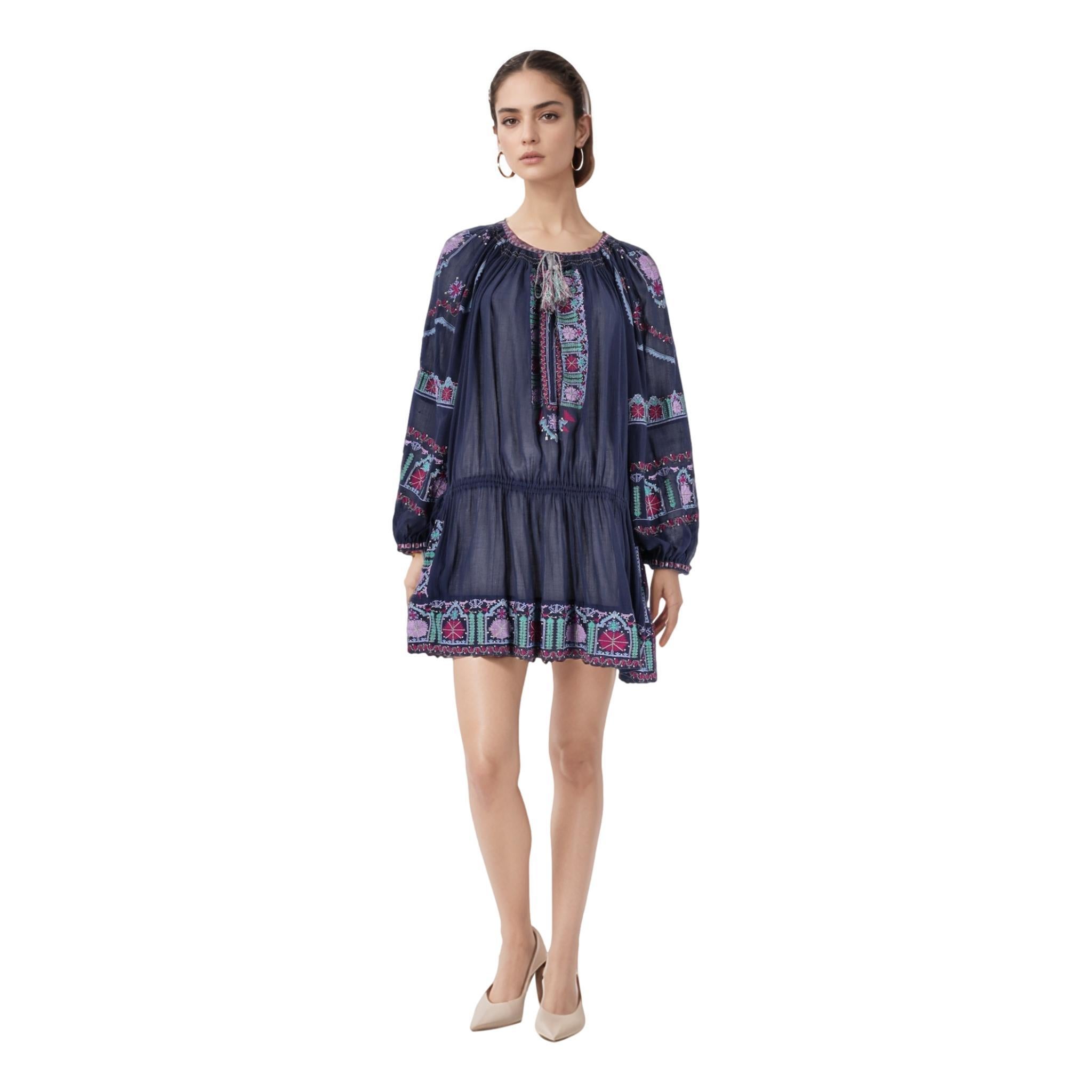 Isabel Marant Embroidered Cotton Dress

Navy 'Cibarya' dress crafted from cotton with multicoloured embroidered pattern with metallic-weave details.

Tie-fastening round-neck with smocked trim, drawstring panels at sides and elasticated