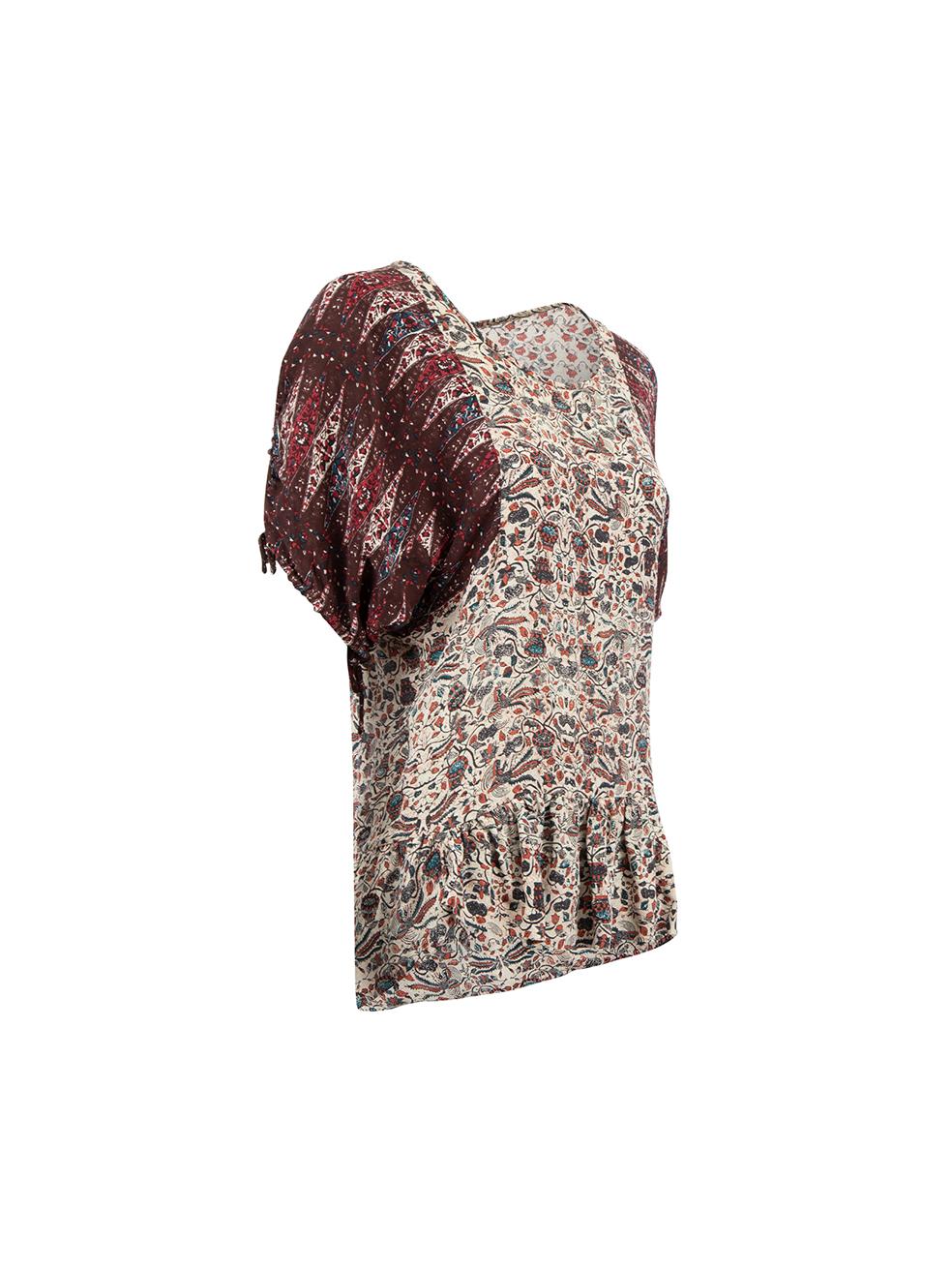 CONDITION is Very good. Hardly any visible wear to top is evident on this used Isabel Marant Étoile designer resale item. 
 
 Details
  Burgundy tone
 Silk
 Peplum top
 Graphic printed pattern
 Round neckline
 Short sleeves with slit and drawstring
