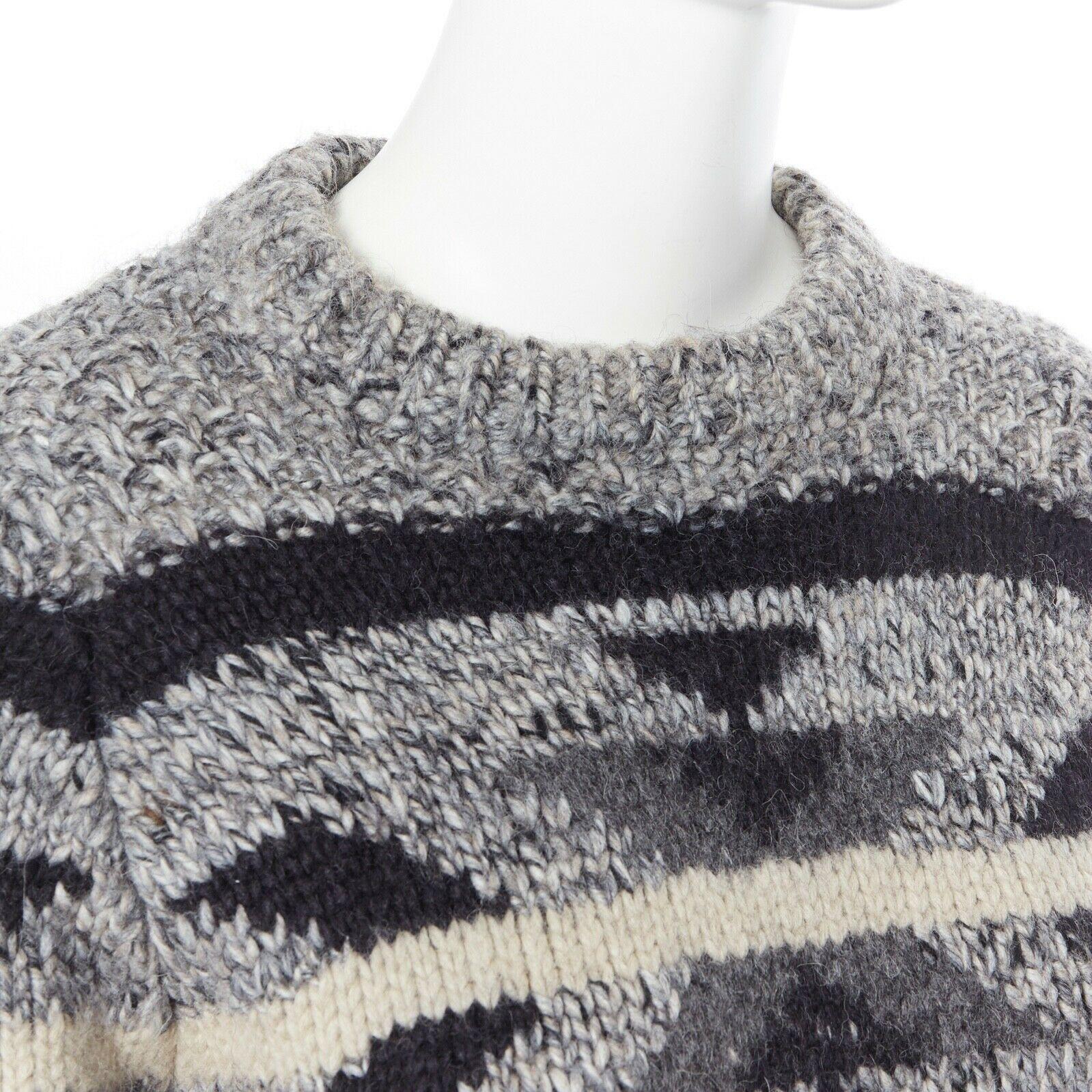 ISABEL MARANT ETOILE grey wool blend knit ski pullover sweater jumper FR36 S 
Reference: JETI/A00169 
Brand: Isabel Marant 
Designer: Isabel Marant 
Material: wool 
Color: Grey 
Pattern: Argyle/Diamond 
Extra Detail: Pullover sweater. Skiwear style.