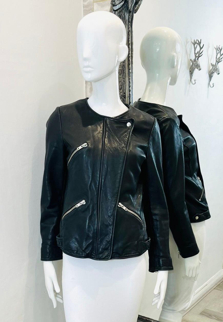Isabel Marant Etoile Lambskin Biker Jacket

Black 'Bradi' jacket designed with asymmetric zipped front with snap-over placket.

Detailed with zipped cuffs, angled zip pockets to the chest and waist.

Featuring slim fit and crew neckline.

Size –