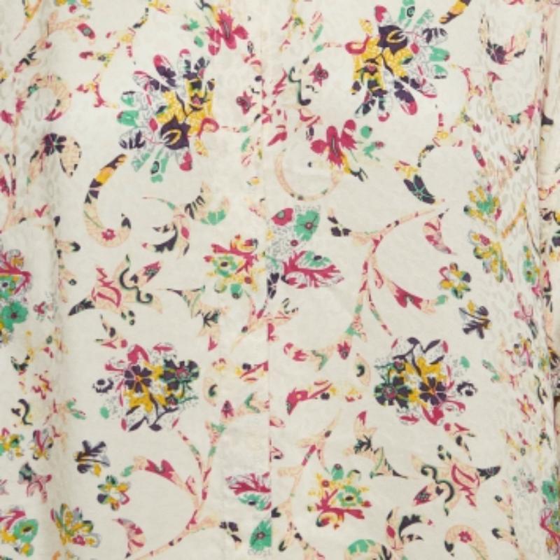 Faites preuve d'élégance avec cette blouse Isabel Marant Etoile. Une confection exquise, un tissu luxueux et des détails uniques créent une pièce d'exception qui redéfinit la sophistication et rehausse votre quotient mode.