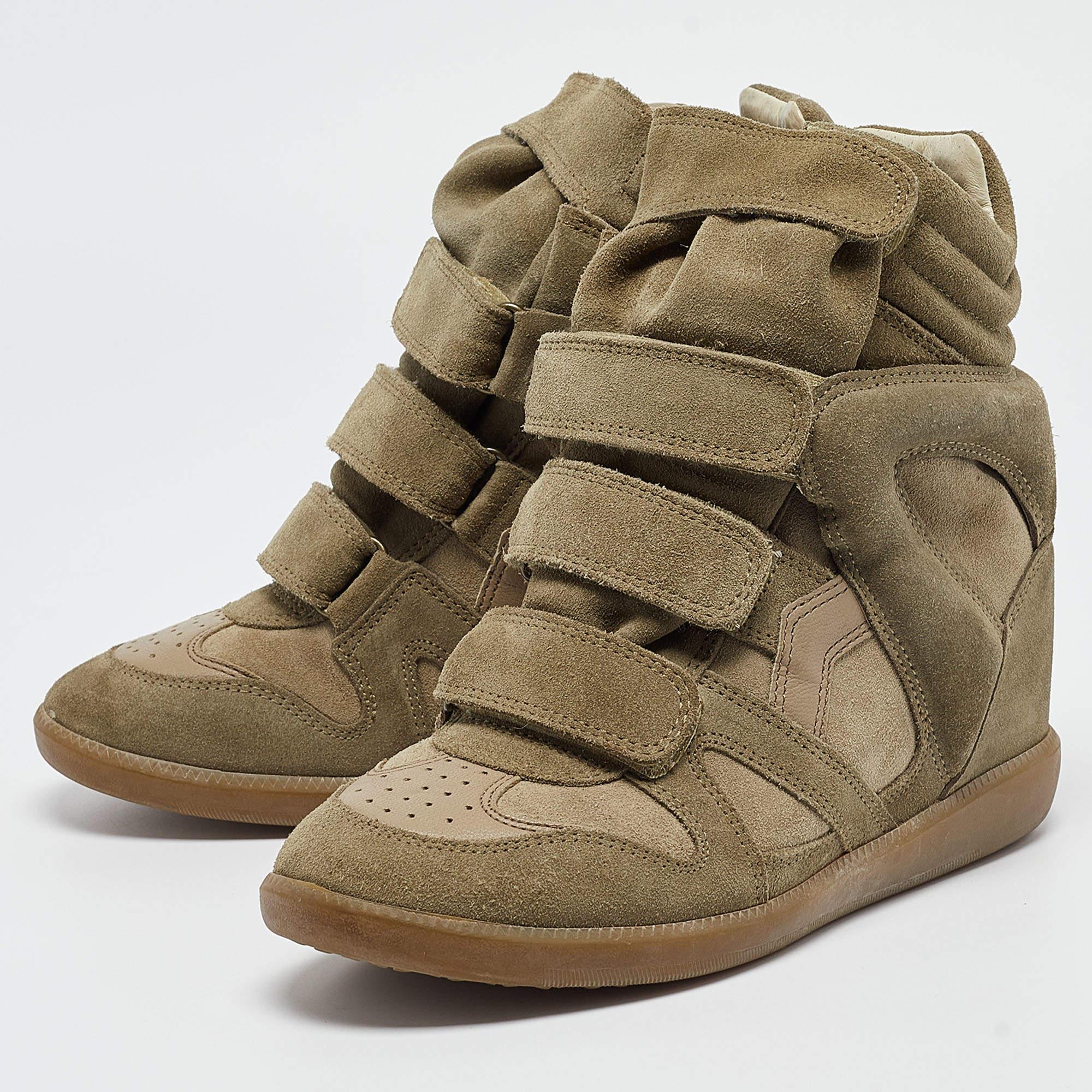 Designed to elevate your style quotient and give you comfort at the same time, these Isabel Marant wedge sneakers are crafted using the best materials. Pair them with your casuals for a cool look.