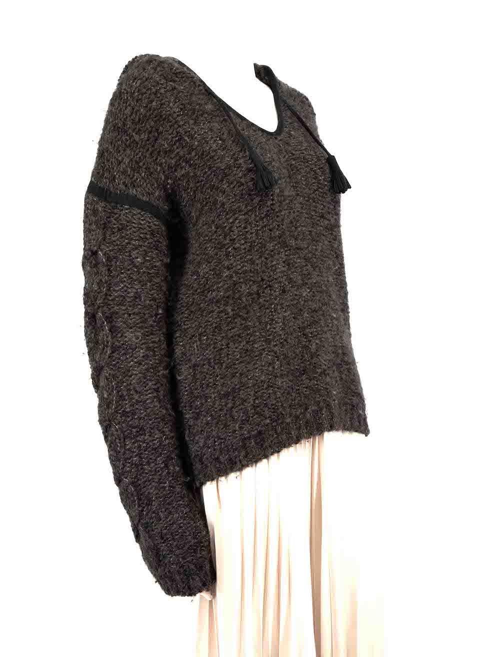 CONDITION is Very good. Hardly any visible wear to jumper is evident on this used Isabel Marant designer resale item.
 
 
 
 Details
 
 
 Grey
 
 Wool
 
 Long sleeves jumper
 
 Hooded
 
 Knitted and stretchy
 
 Suede tie strap on neckline
 
 
 
 
 
