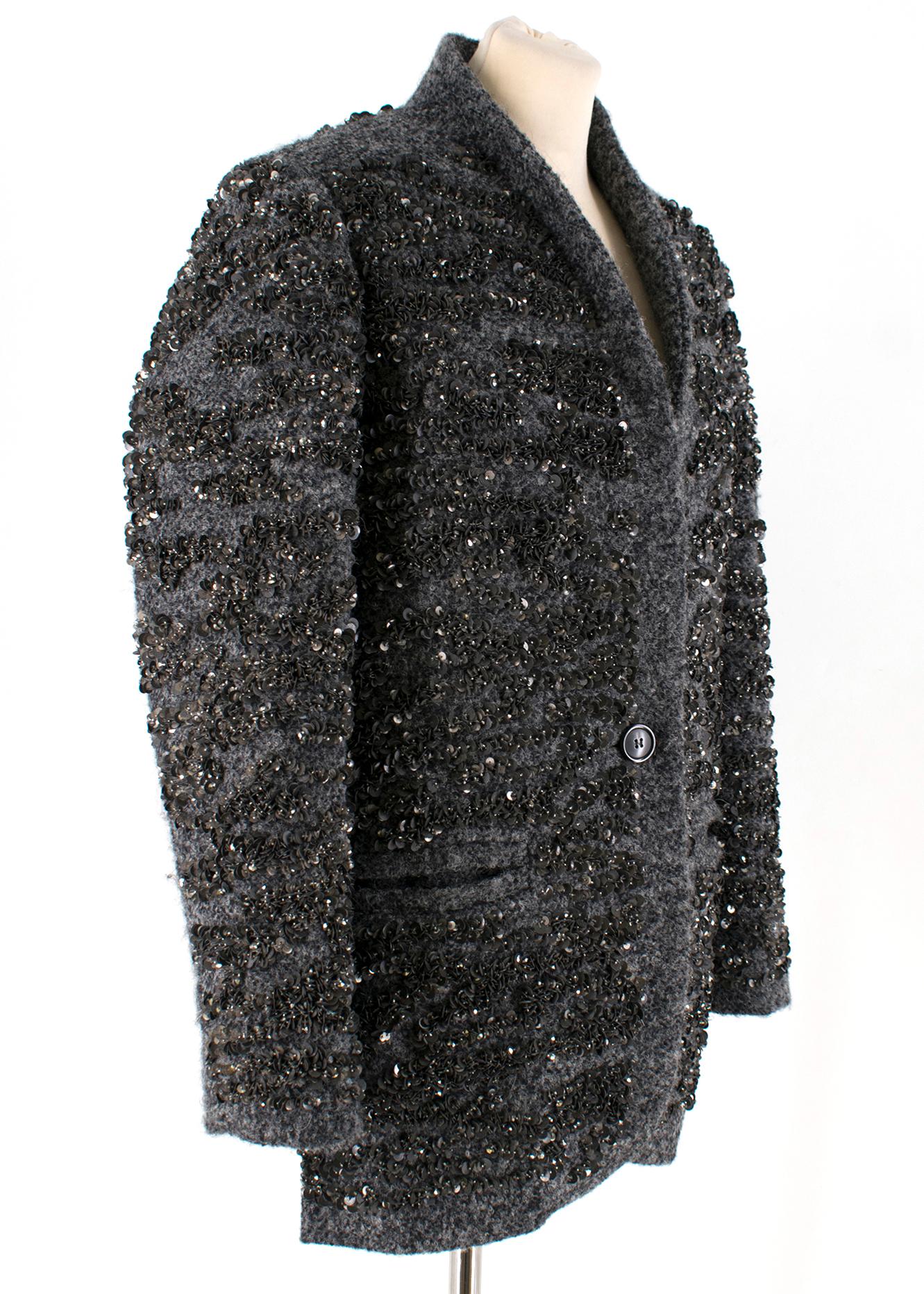 Isabel Marant Gunmetal Sequin Wool Blend Jacket 

- Gunmetal Grey Jacket
- Sequin and Bead embellished farbic 
- Button front closure
- Front welt pockets
- Padded shoulders
- Stand up collar 
- Fully lined 
- Heavy weight 

Please note, these items