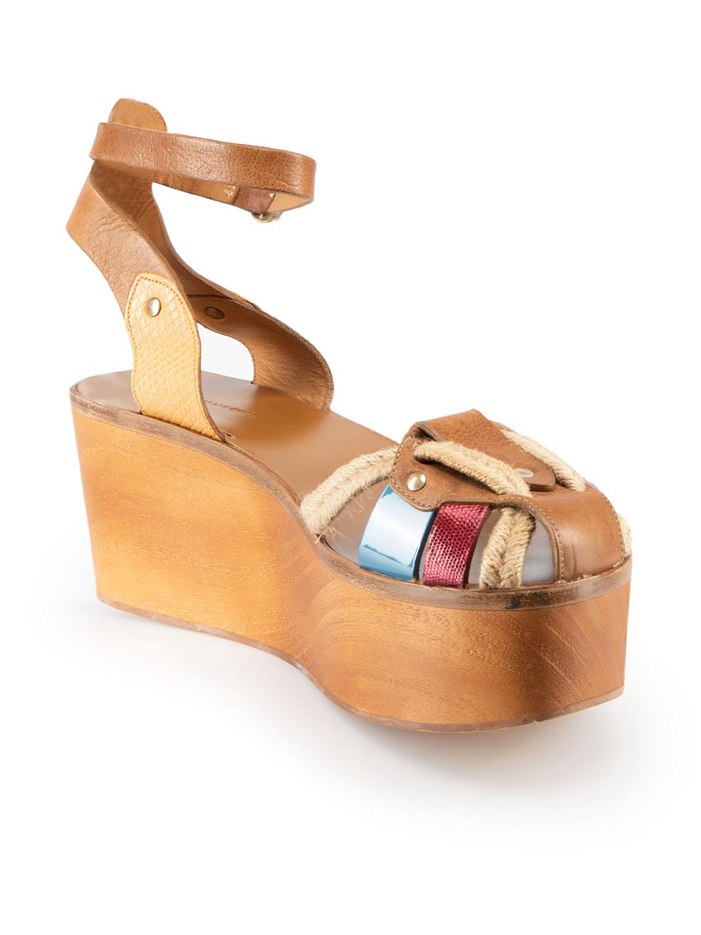 CONDITION is Very good. Minimal wear to sandals is evident. Minimal indentations to wooden platform on this used Isabel Marant √âtoile designer resale item. These shoes come with original box and dust bag.
 
Details
Brown
Leather
Platform