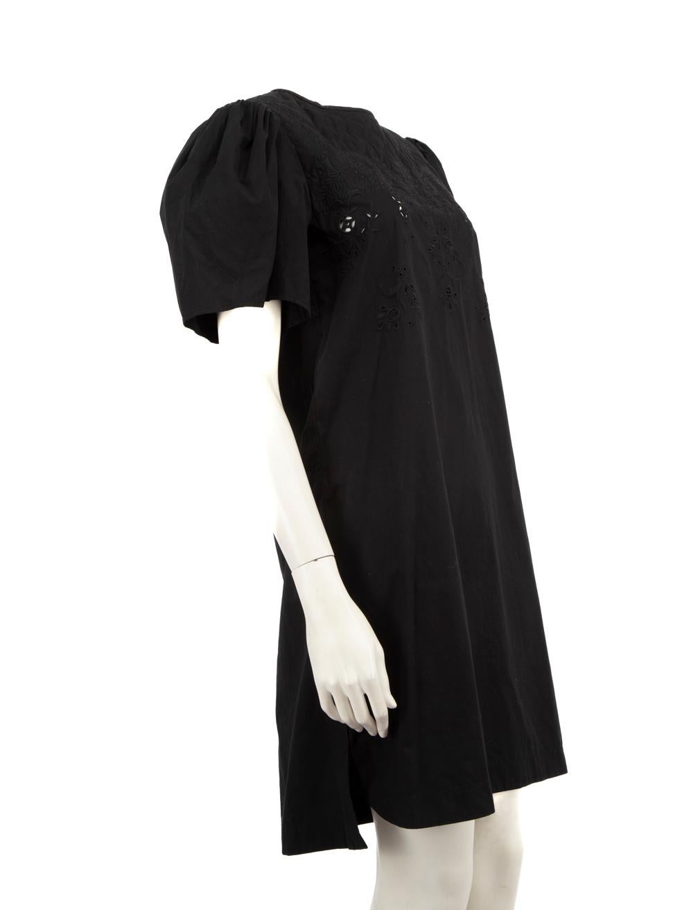 CONDITION is Very good. Minimal wear to the dress is evident. Light discolouration on the inside of the neckline, the right sleeve, the back yoke and on the back of the slip dress. Plucks to the weave on the slip dress to the front neckline on this