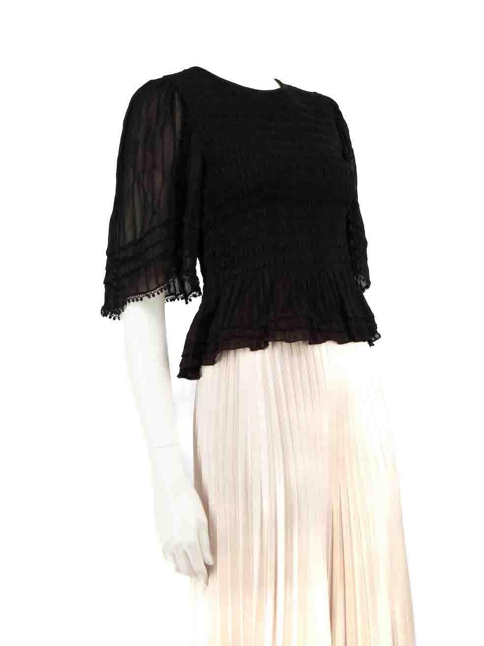 CONDITION is Very good. Hardly any wear to top is evident on this used Isabel Marant Etoile designer resale item.
 
 
 
 Details
 
 
 Black
 
 Viscose
 
 Mid sleeves top
 
 Ruched accent
 
 Round neckline
 
 Elasticated and stretchy
 
 Back keyhole