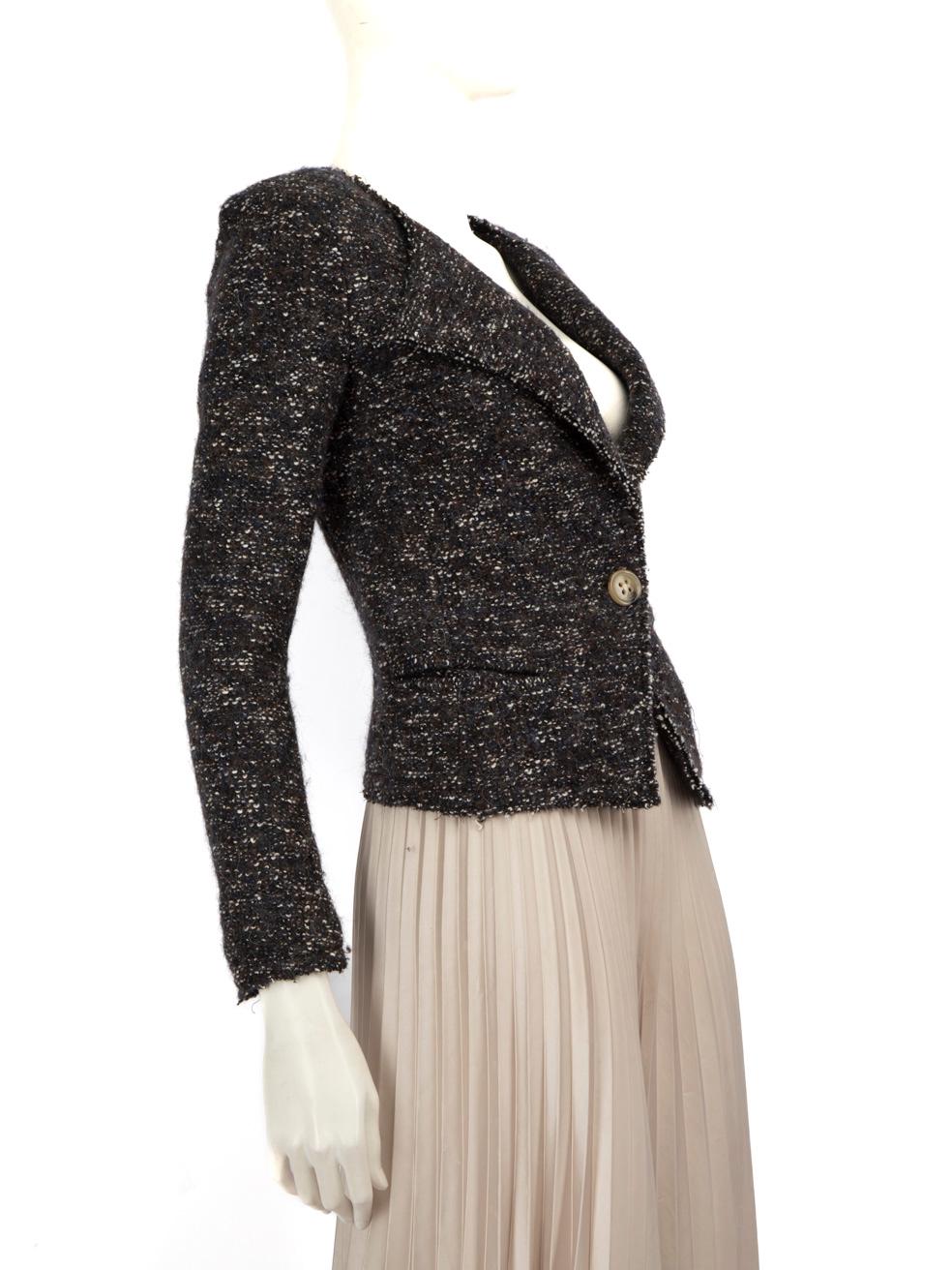CONDITION is Very Good. Hardly any visible wear to the jacket is evident on this used Isabel Marant Étoile designer resale item.

Details


Black

Cotton

Blazer

Tweed pattern

Padded shoulders

2x Front pockets

Button closure





Made in