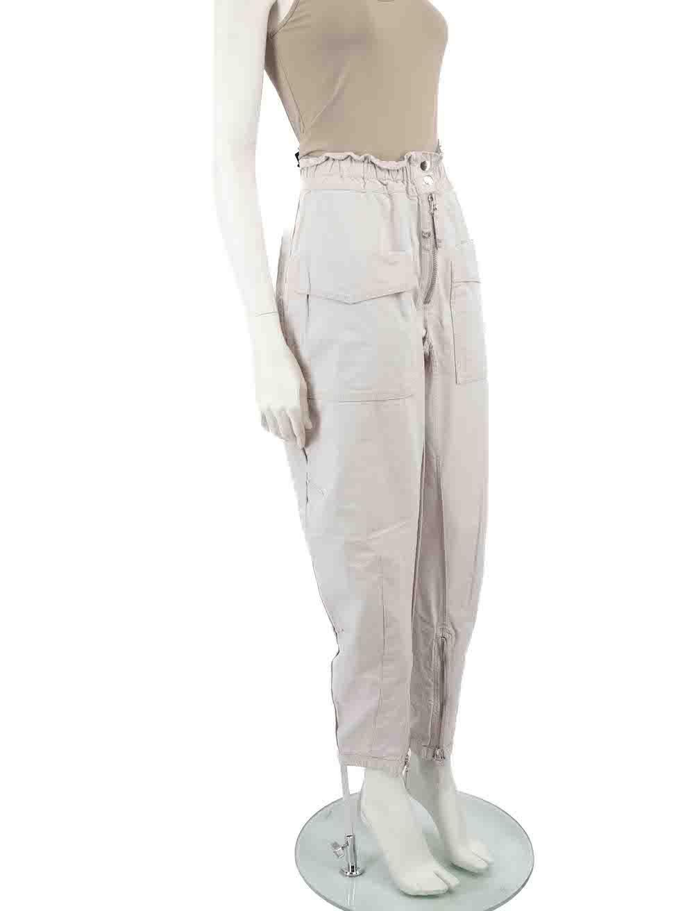 CONDITION is Very good. Minimal wear to trousers is evident. Minimal wear to the centre-front where the bartack has been repaired on this used Isabel Marant Etoile designer resale item.
 
 Details
 Grey
 Cotton
 Tapered trousers
 High rise
