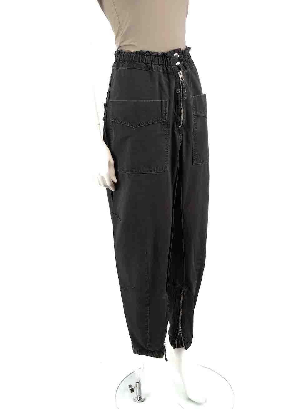 CONDITION is Very good. Hardly any visible wear to trousers is evident on this used Isabel Marant Étoile designer resale item.
 
 Details
 Grey
 Cotton
 Tapered trousers
 High rise
 Elasticated waistband
 Front zip closure with snap buttons
 2x