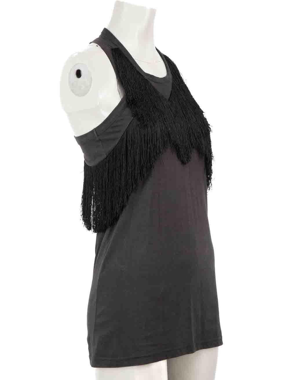 CONDITION is Very good. Minimal wear to top is evident. Minimal wear to fabric finish with slight fading of the wash evident on this used Isabel Marant Etoile designer resale item.

Details
Grey
Cotton
Sleeveless tank top
Fringed accent
Round