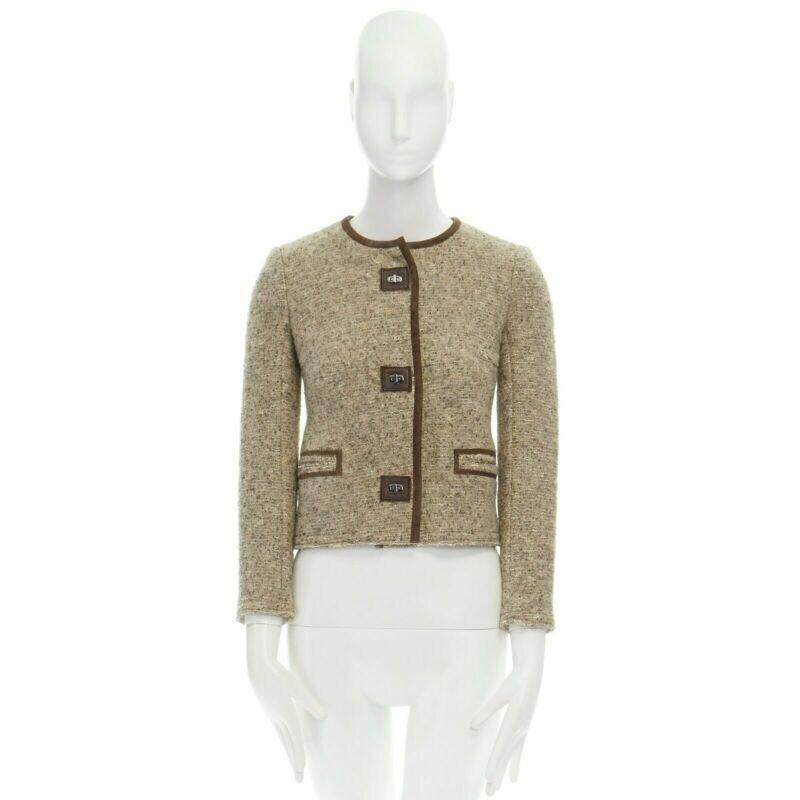 ISABEL MARANT Kios brown virgin wool boucle suede trimmed twist lock jacket FR36
Reference: CC/JYFG00179
Brand: Isabel Marant
Designer: Isabel Marant
Model: Kios
Material: Virgin Wool
Color: Beige
Pattern: Solid
Closure: Button
Extra Details: Kios