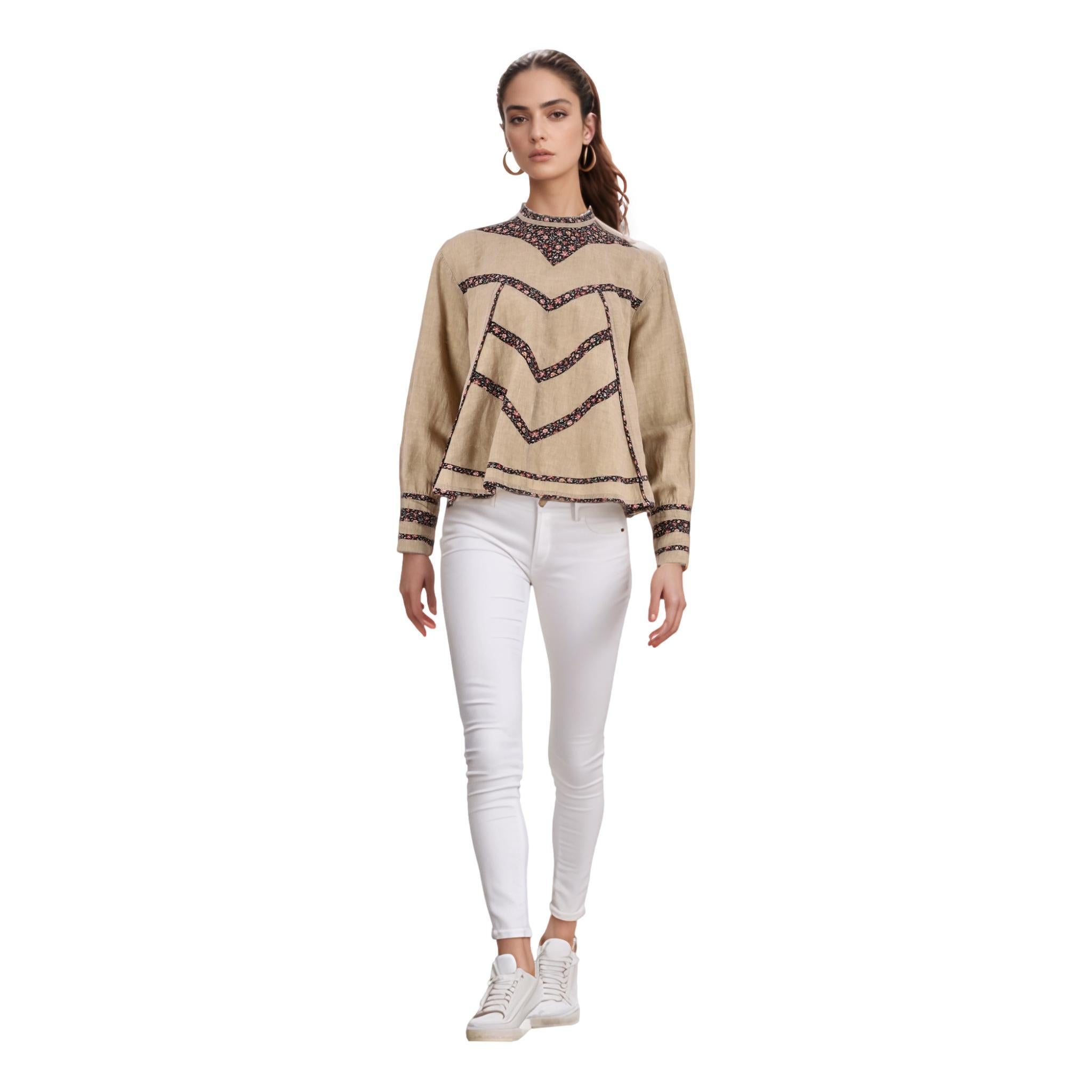 Top in lino Isabel Marant con finiture floreali

Camicetta beige in cotone con stampa floreale.

Caratterizzato da maniche a palloncino con polsini abbottonati. Girocollo e vestibilità rilassata.

Prezzo di listino circa 530 euro

Taglia -