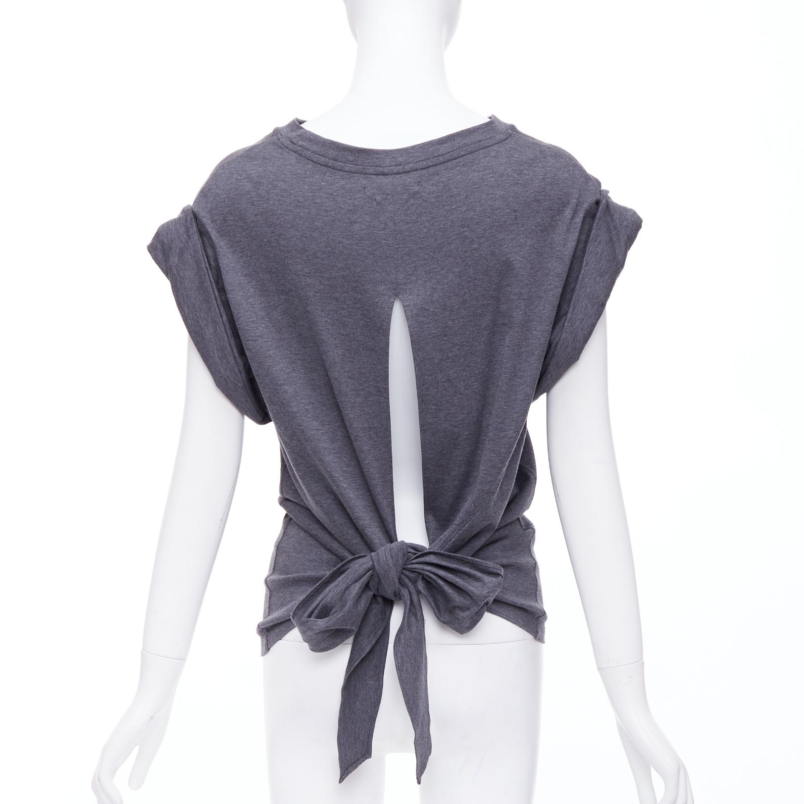 ISABEL MARANT Lowell Graues Baumwolloberteil mit gerollten Tropfenärmeln und offenem Krawattenrücken FR36 S
Referenz: NKLL/A00283
Marke: Isabel Marant
MATERIAL: Baumwolle
Farbe: Grau
Muster: Solide
Verschluss: Selbstbinder
Zusätzliche Details: