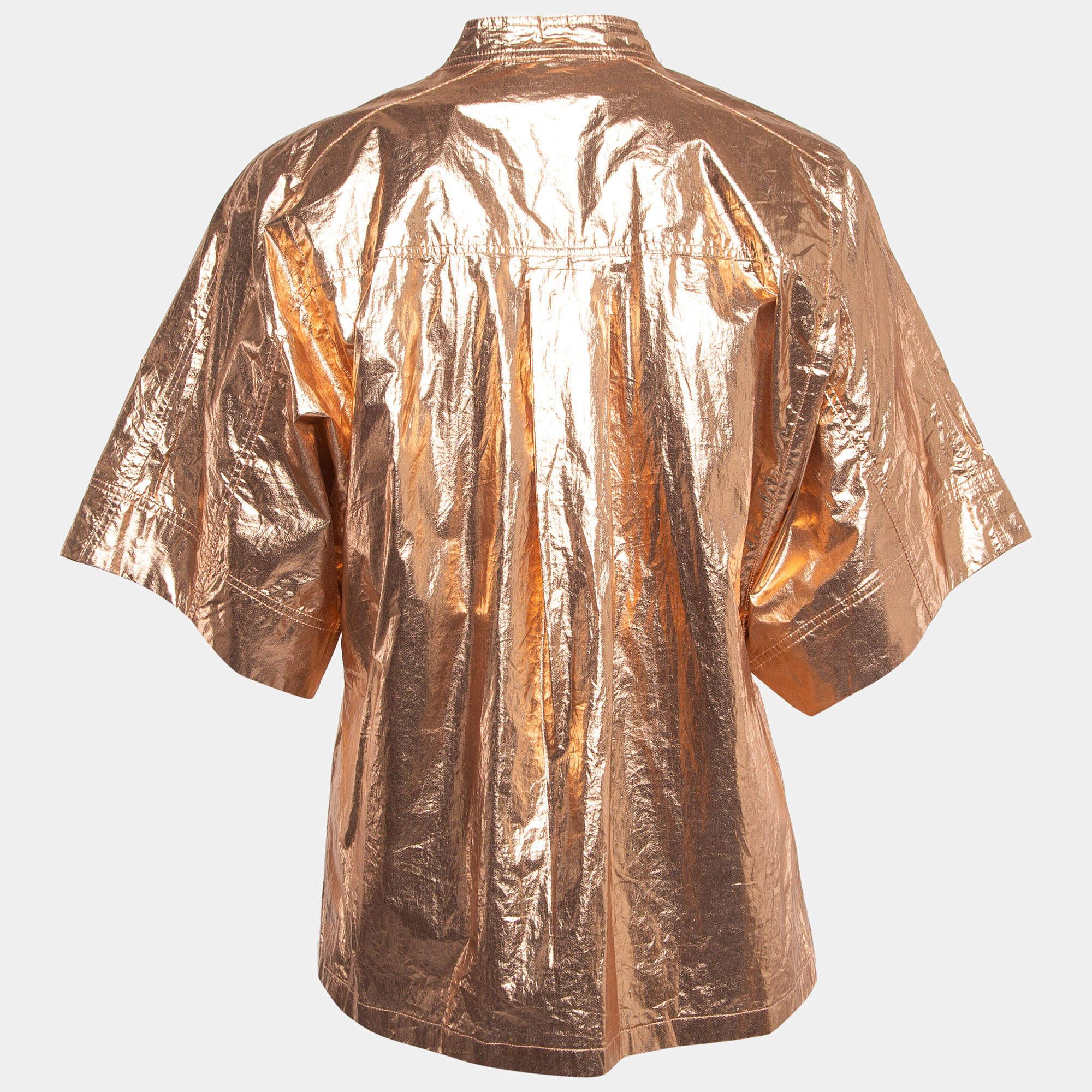 Let the latest addition to your closet be this Isabel Marant top for women. Meticulously tailored and effortlessly chic, it comes in a gorgeous metallic rose hue.