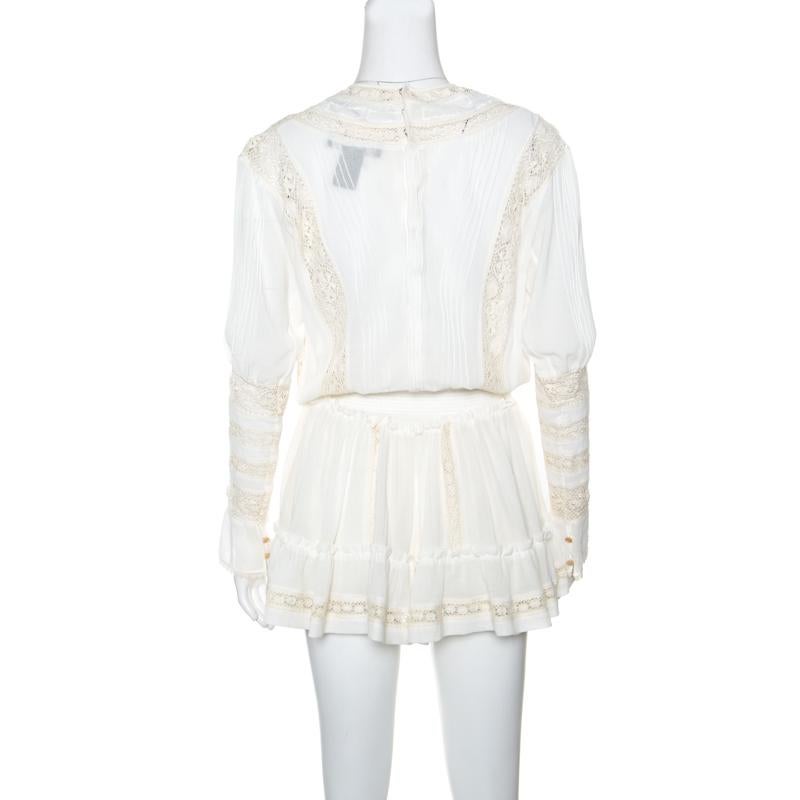 Flattering and feminine, this peasant dress from Isabel Marant is perfect for channelling an air of elegance! The off-white dress is made of 100% cotton and features a smocked waist silhouette. It flaunts a beautiful detailing of York lace all over