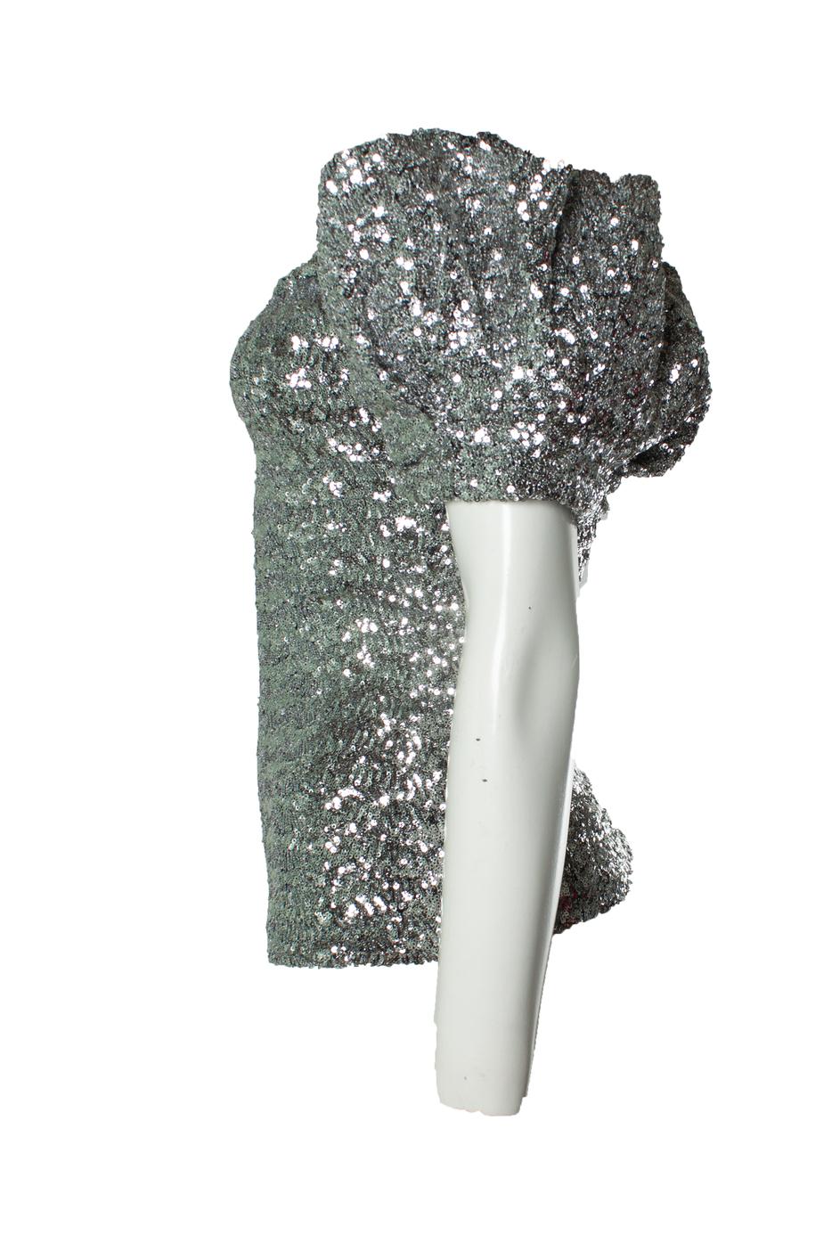 Isabel Marant, top monospalla con paillettes in argento. L'articolo è in ottime condizioni. 

CONDIZIONE: ottime condizioni

TAGLIA: FR36 - XS

MISURE: lunghezza 56 cm, larghezza 35 cm, vita 29 cm, larghezza spalle cm, lunghezza maniche 9