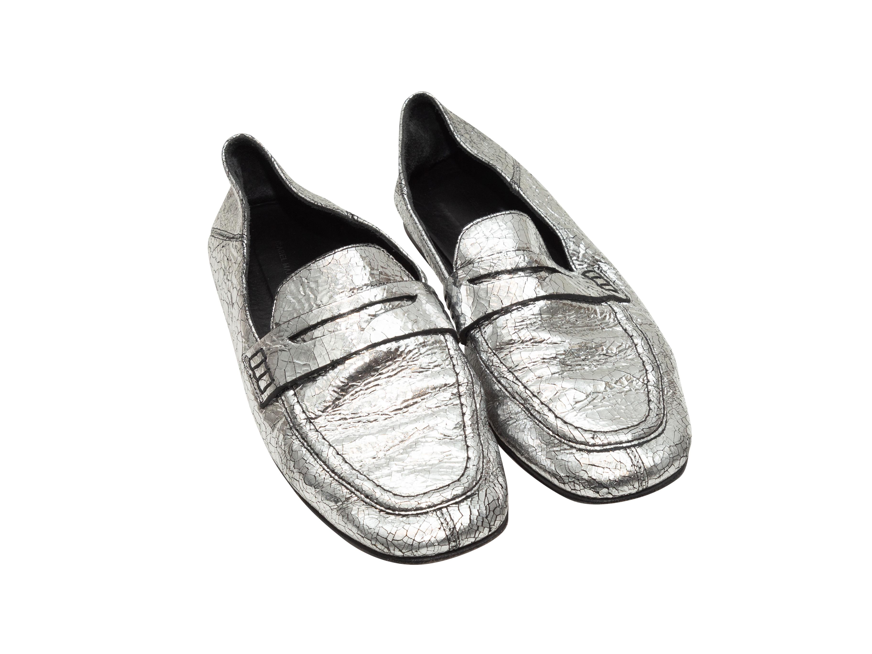 Product details: Silver metallic crackle leather loafers by Isabel Marant. Stacked heels. 0.5